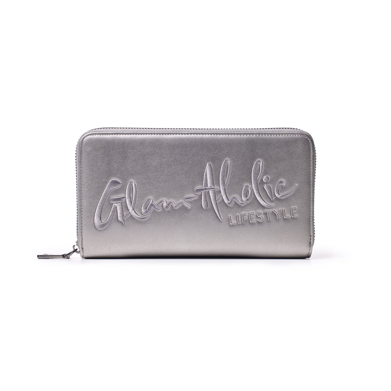 Silver metallic wallet with "Glam-athic Lifestyle" embroidered in large, cursive letters on the front, featuring a zip-around closure.