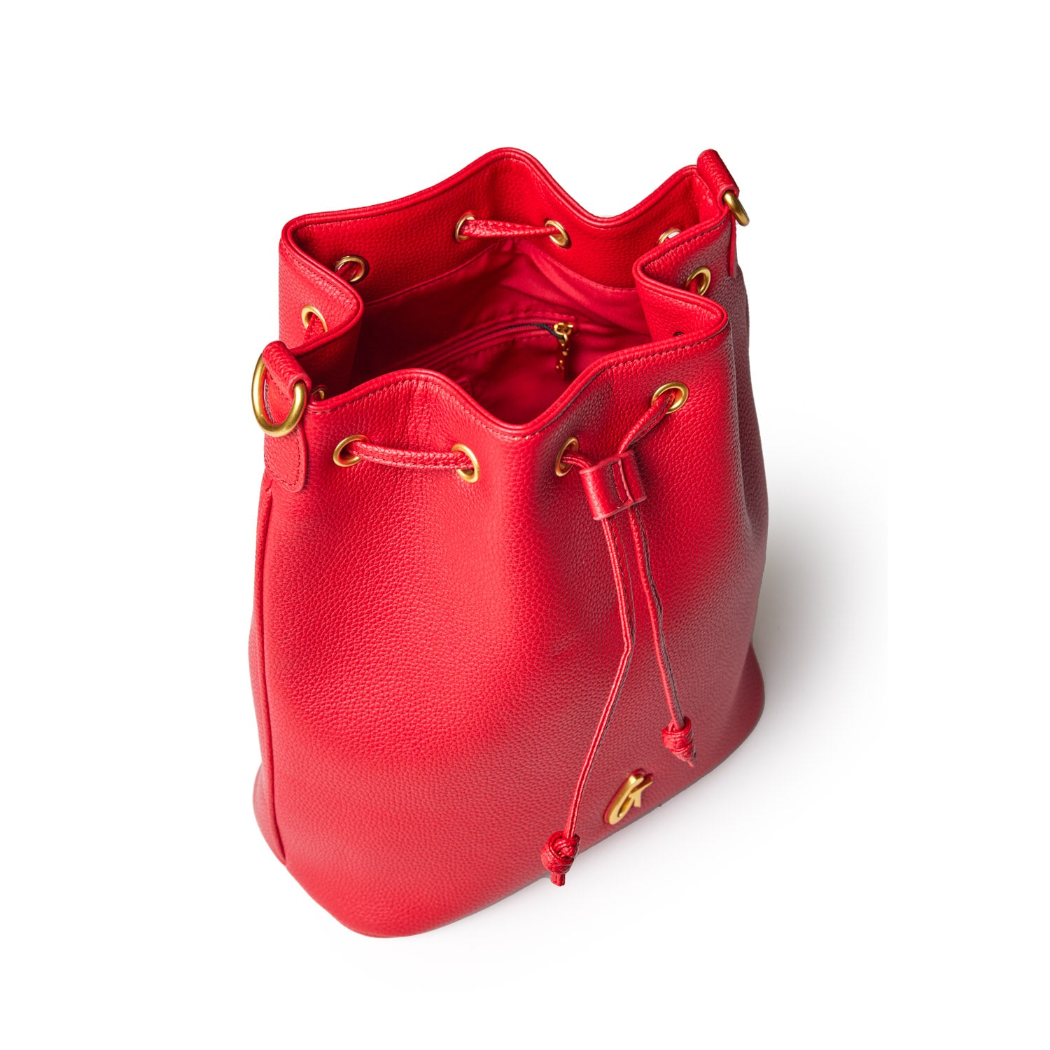 Red pebble leather bucket bag with gold hardware, drawstring closure, and interior zip pocket, shown from above.