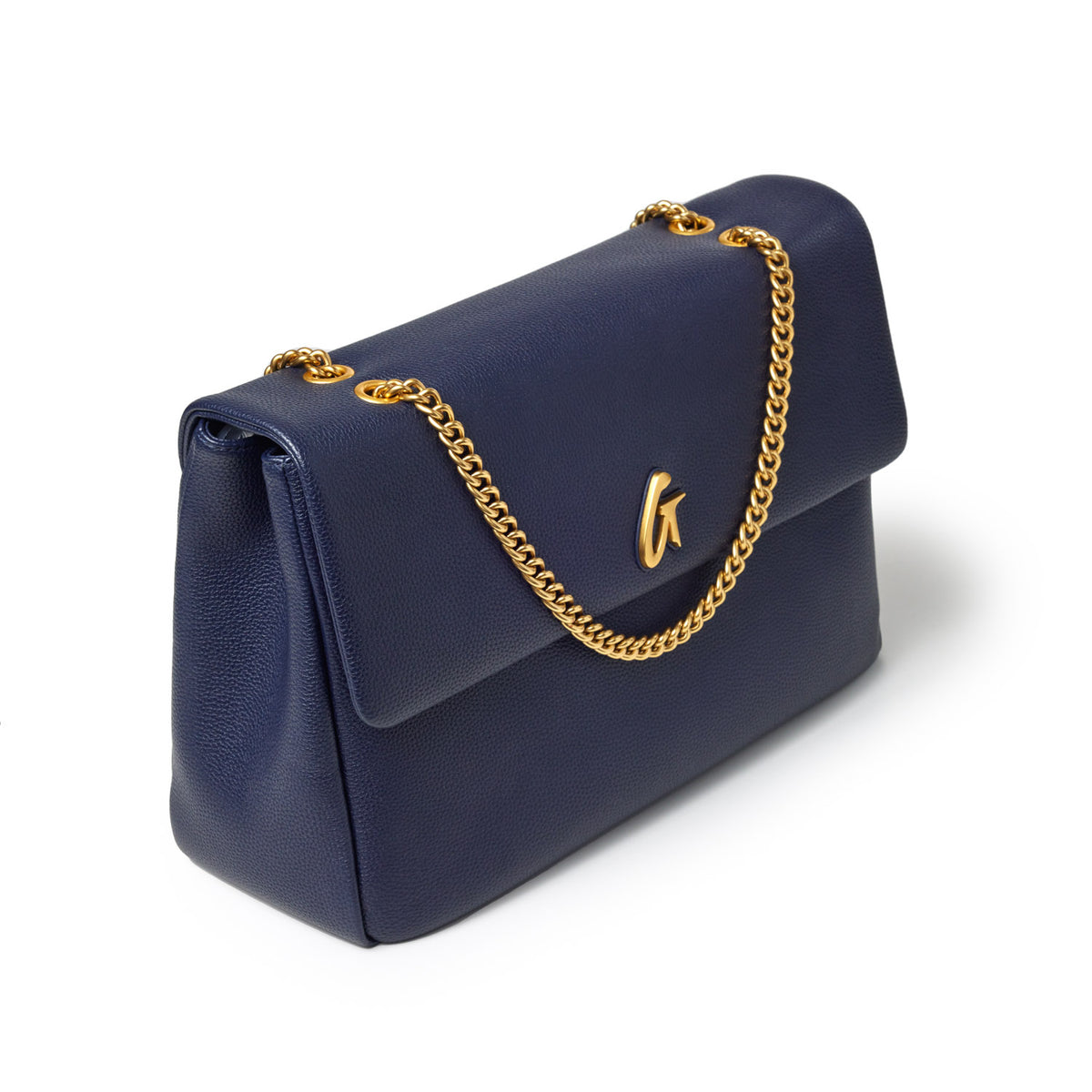 Large navy pebble leather flap bag with a gold chain strap and a gold logo on the front.