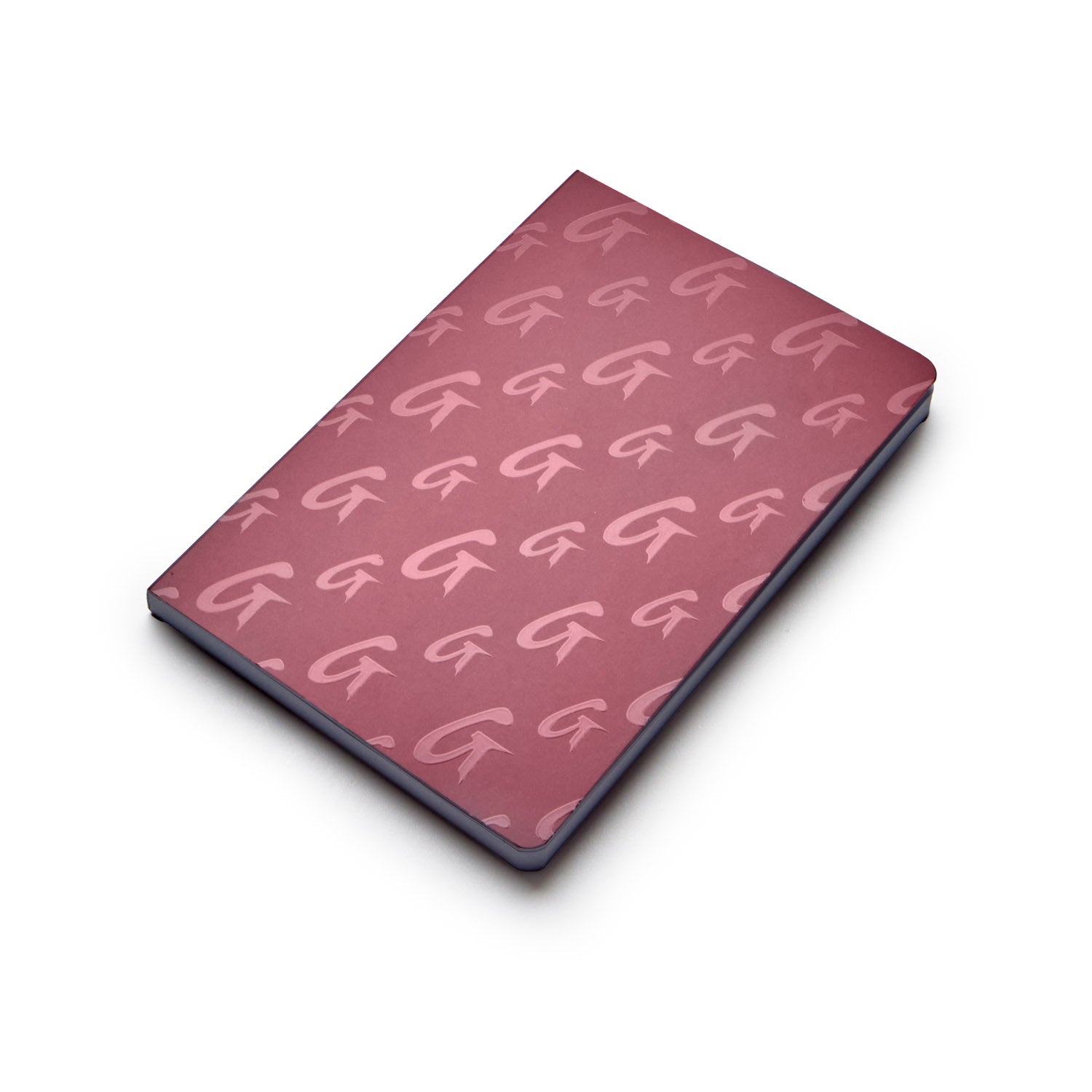 Burgundy notebook featuring a stylish monogram pattern, perfect for notes and journaling in luxury style.