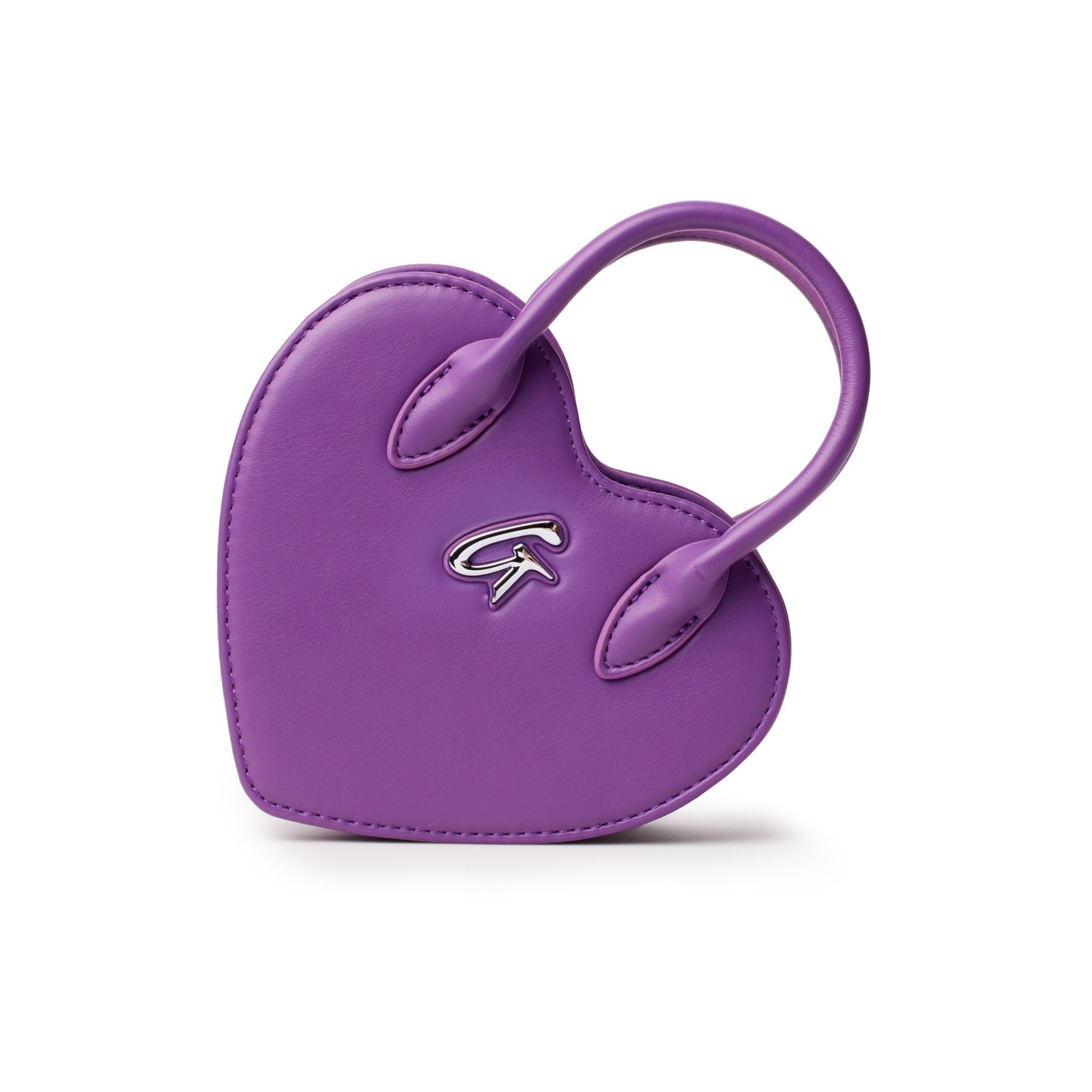 Small purple heart-shaped bag with a silver logo, featuring a rounded handle and smooth leather finish.