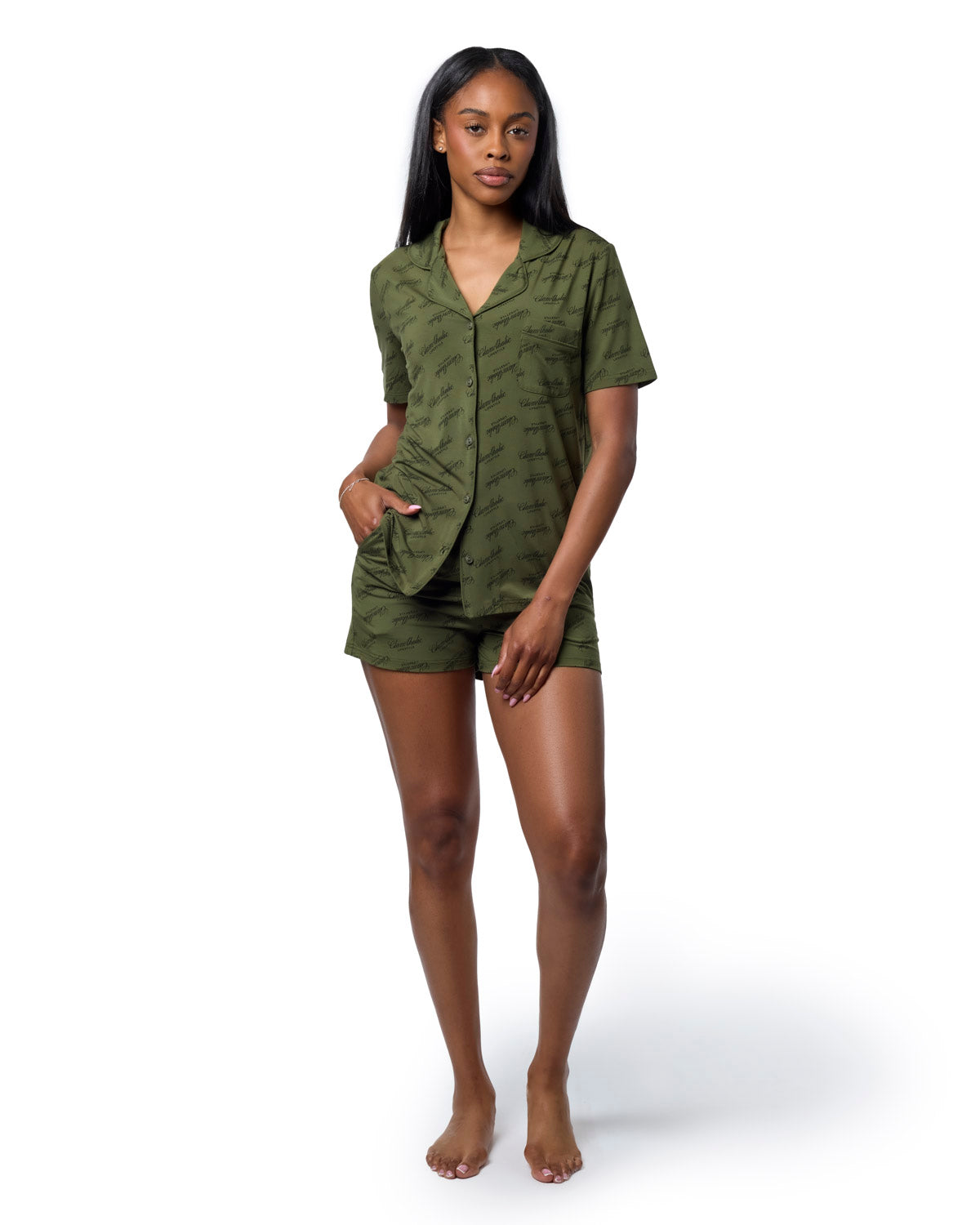 Green signature luxe pajama short set featuring a button-up top and matching shorts, designed for stylish comfort.