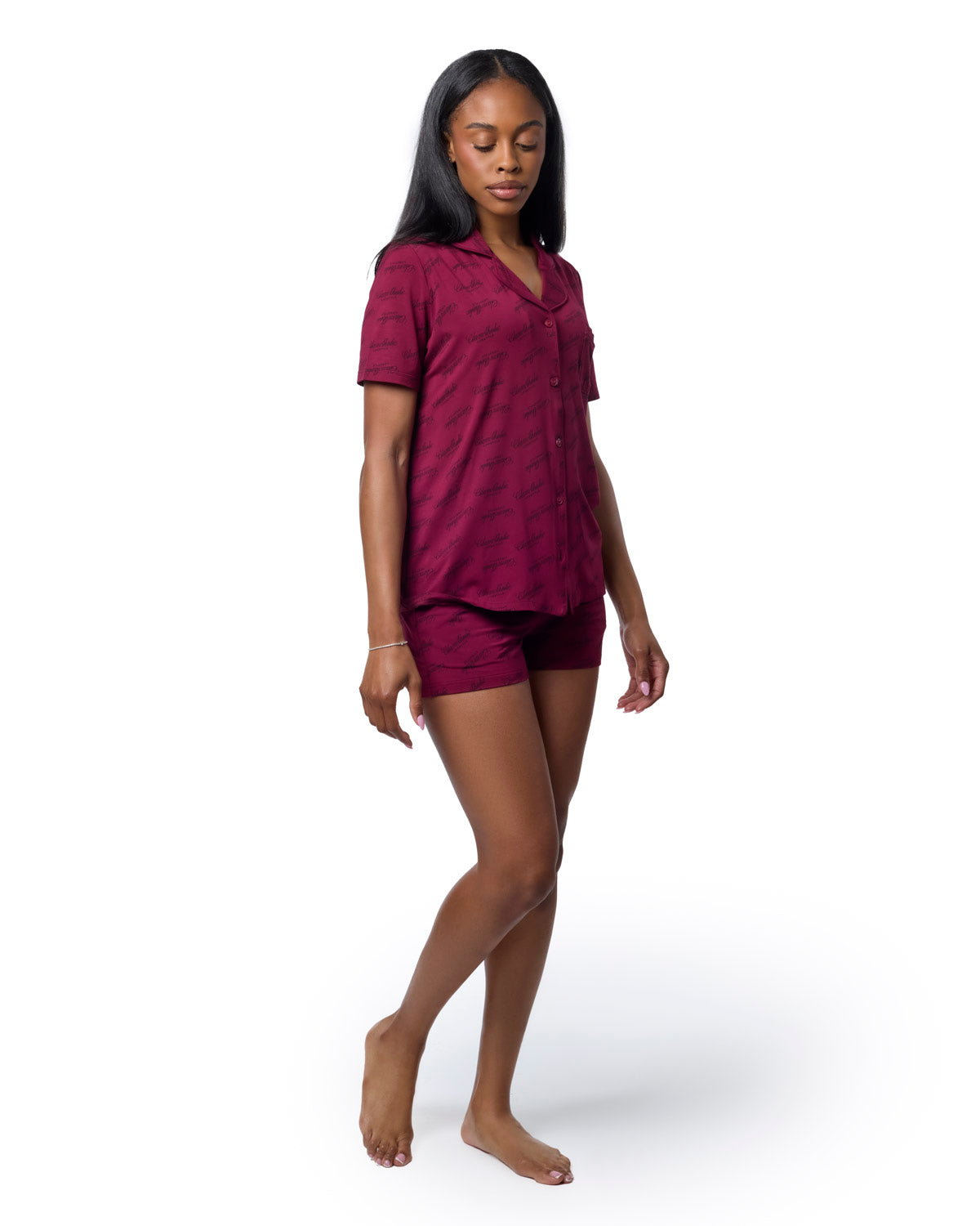 Burgundy short pajama set featuring a button-up top and matching shorts, designed for comfort and style.