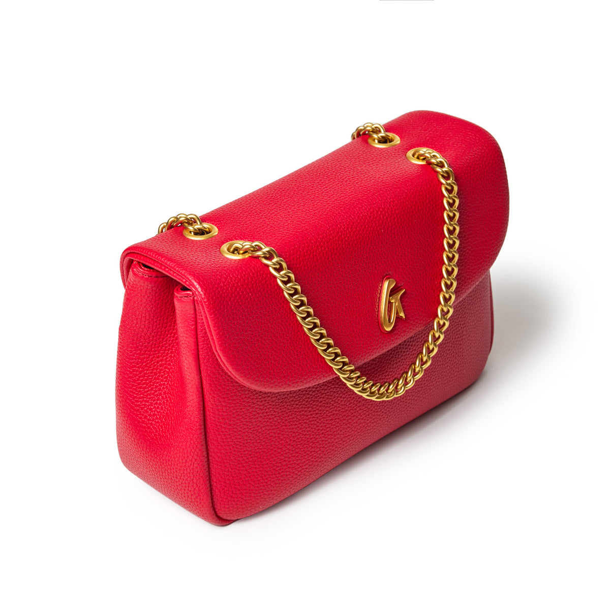 Red medium pebble leather flap bag with gold chain strap and a gold logo on the front.