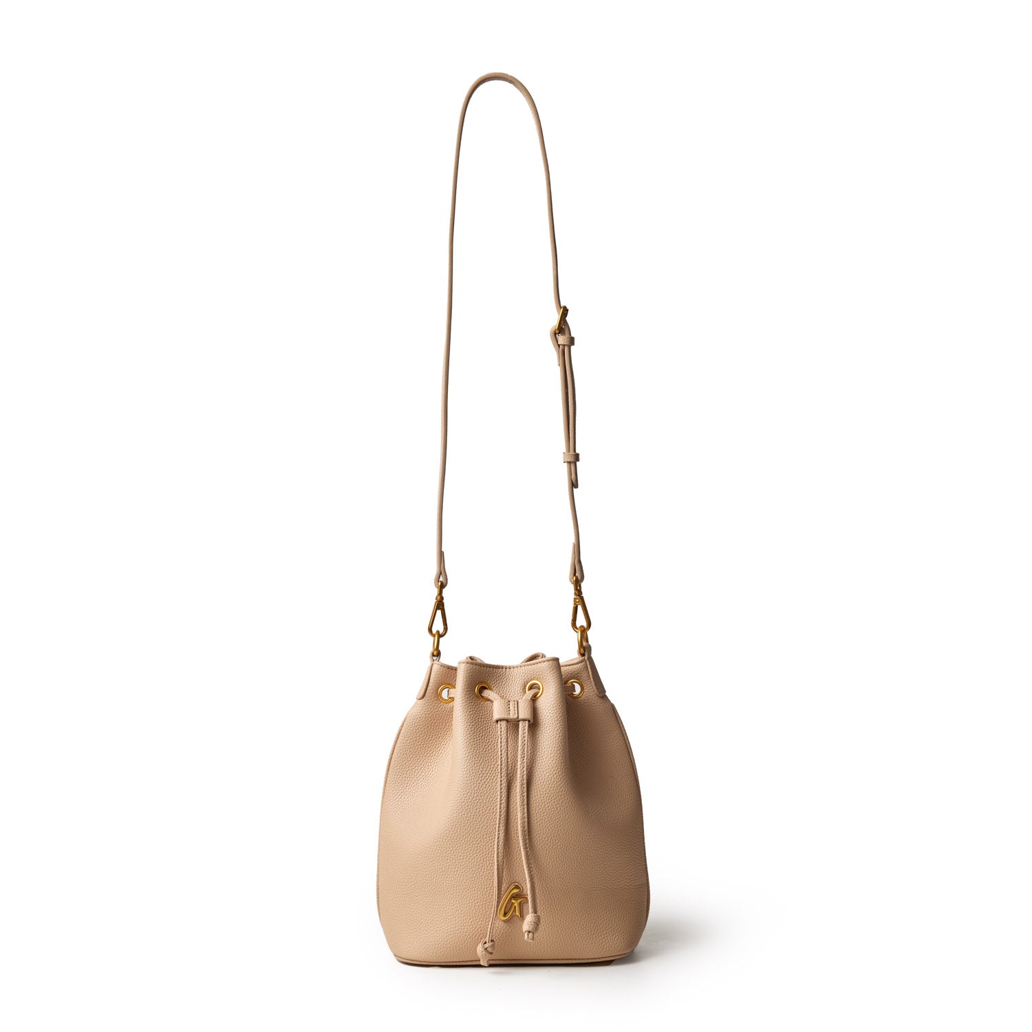 Medium pebble bucket bag in nude color with a drawstring closure and adjustable shoulder strap, featuring gold-tone hardware.