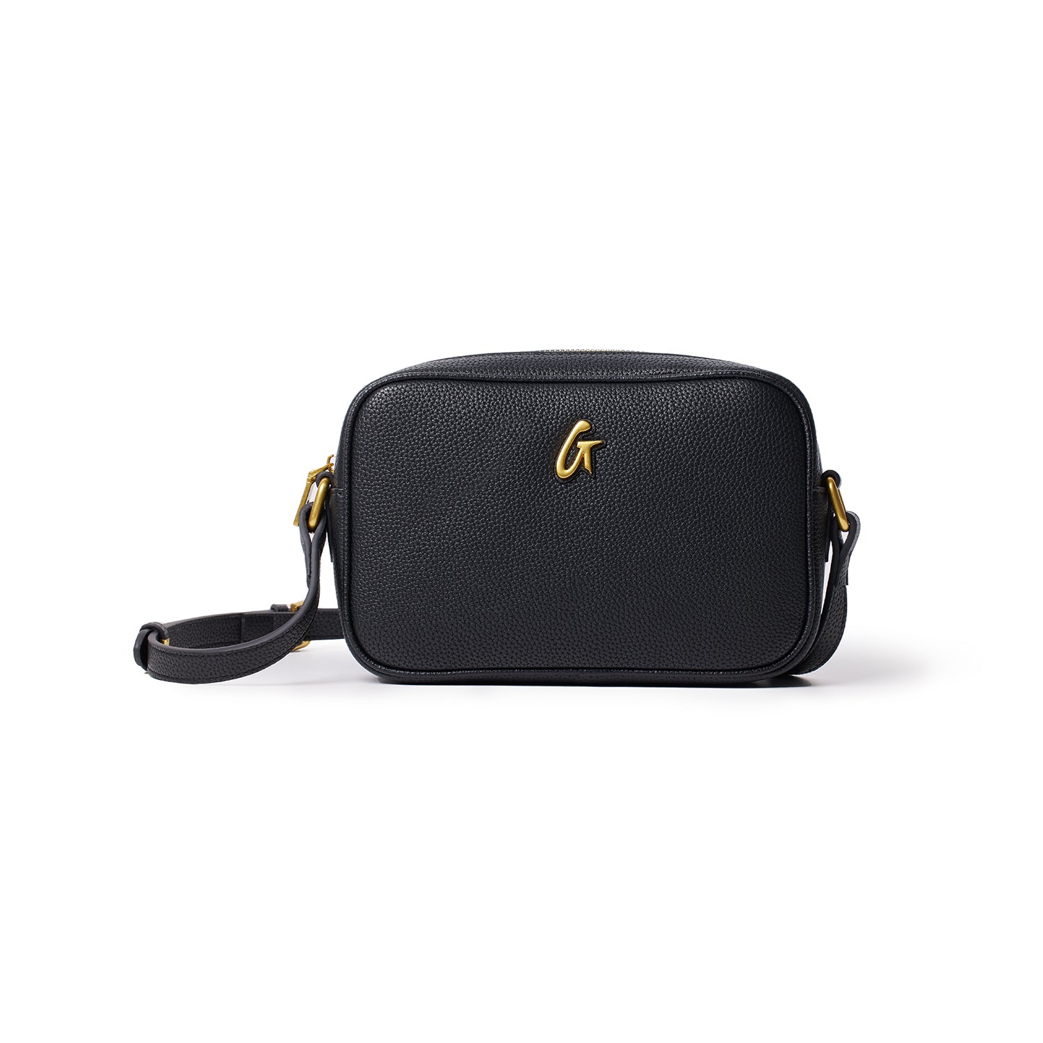 Black pebble-textured camera bag with a gold logo, adjustable strap, and compact rectangular design.