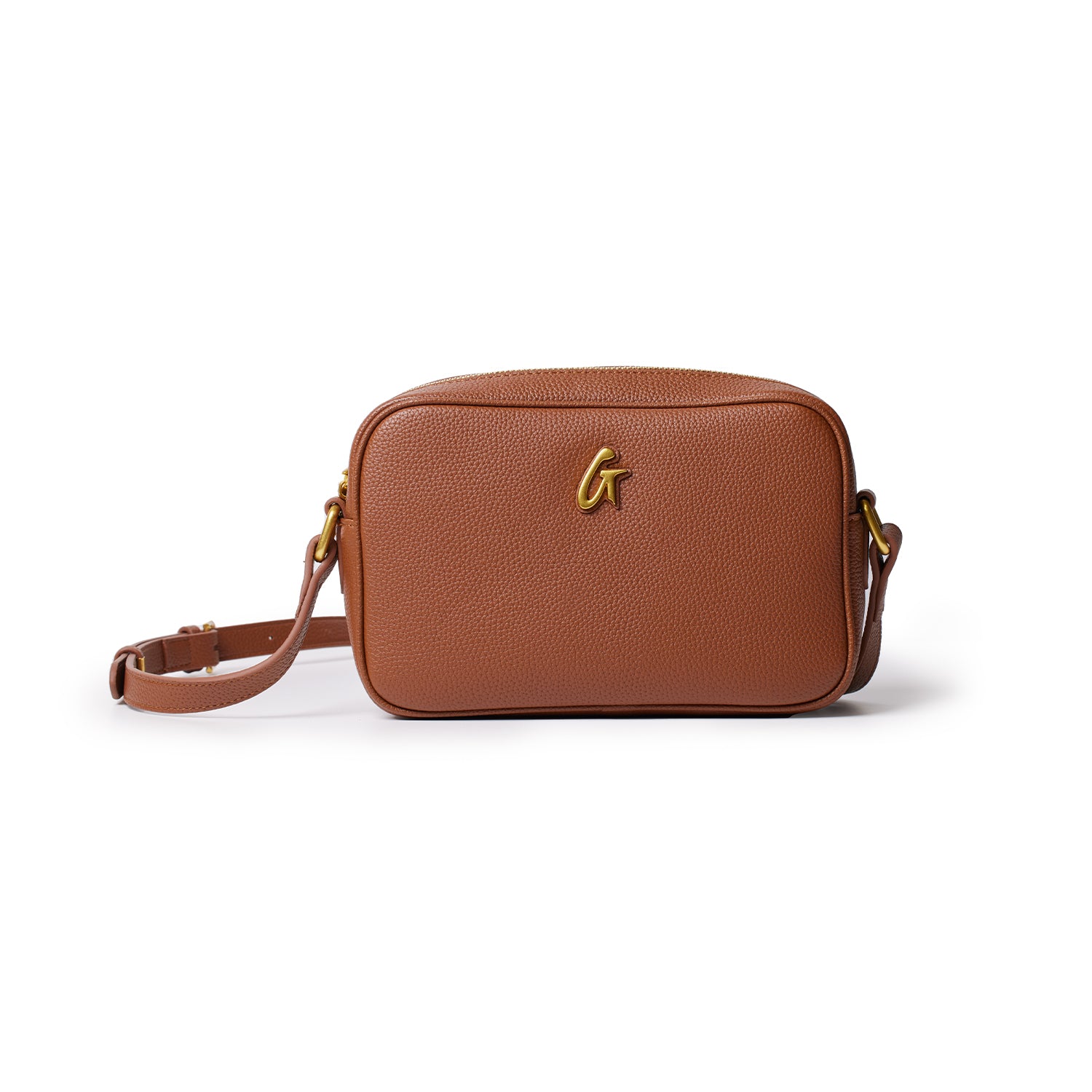 Brown leather camera bag with a gold logo, adjustable strap, and compact rectangular design.