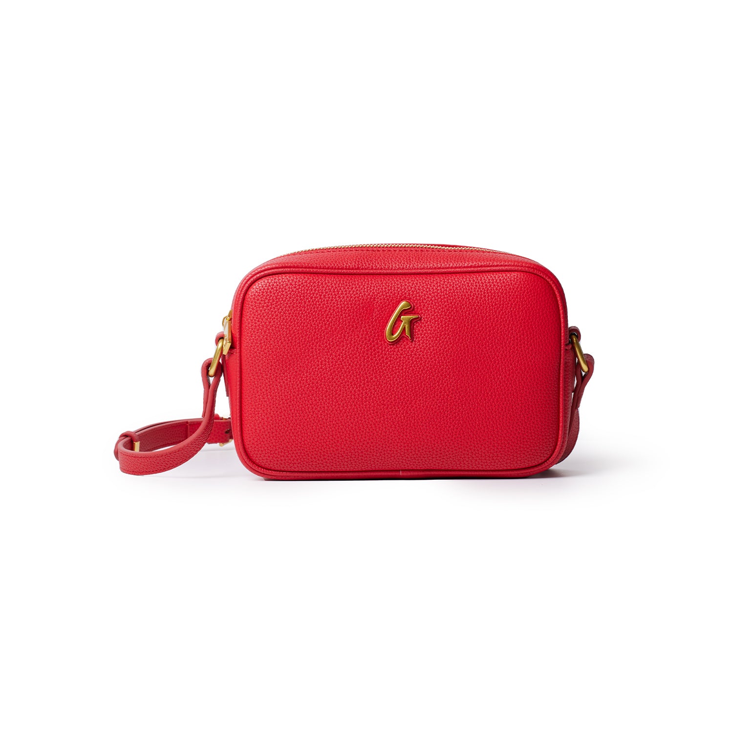 Red pebble-textured camera bag with gold logo and adjustable strap, designed for stylish camera storage.