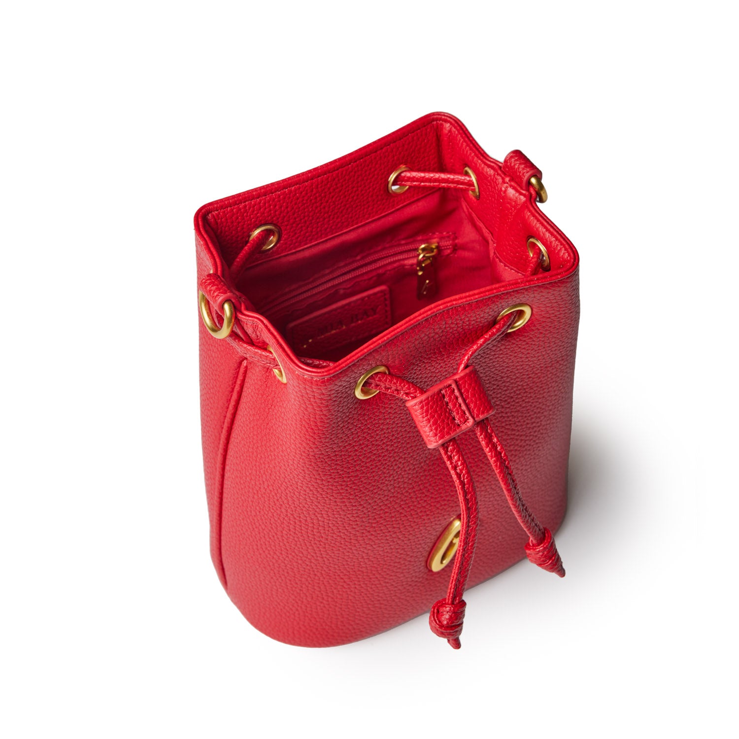 Red pebble-textured bucket bag with gold-tone eyelets, drawstring closure, and interior zip pocket, shown from above.