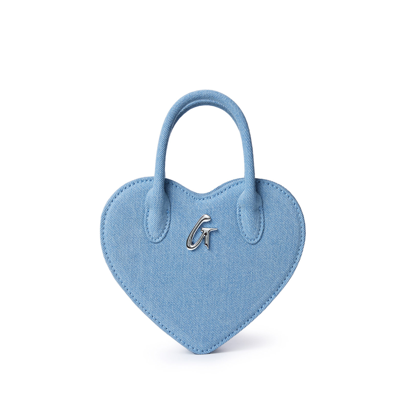 Mini denim heart-shaped bag with top handles and a silver "G" logo, perfect for a cute, casual accessory.