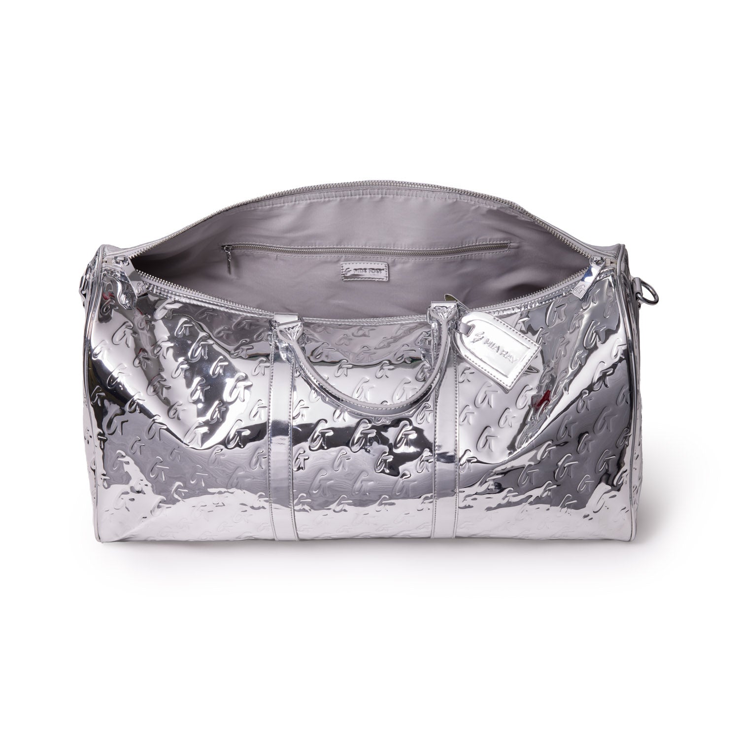 Silver metallic duffle bag with embossed logo pattern, interior zip pocket, and top handles.