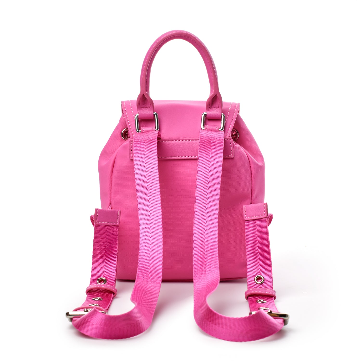 Mini nylon backpack in vibrant hot pink with adjustable straps and top handle, perfect for stylish everyday use.