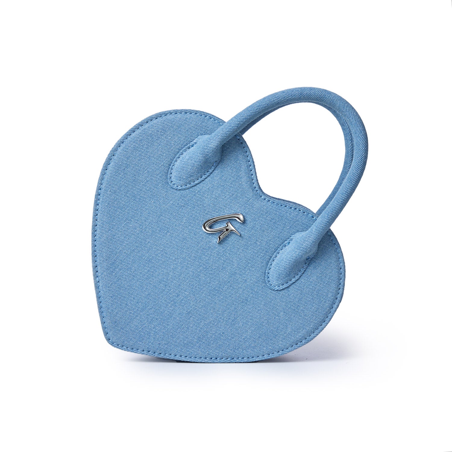 Light blue denim heart-shaped bag with a small metal logo, featuring a top handle and a minimalist design.