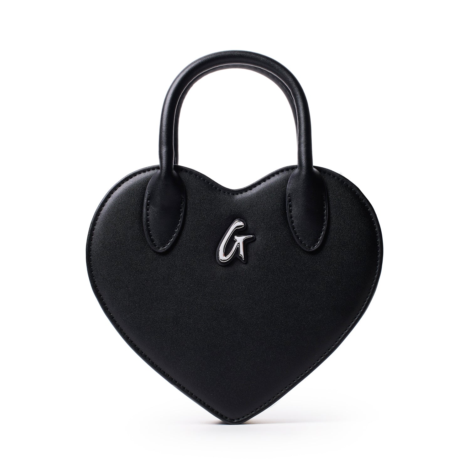 Black heart-shaped bag with top handles and a silver "G" logo on the front, designed for stylish everyday use.