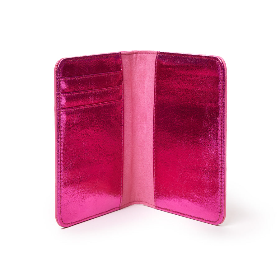 Mirror hot pink monogram passport holder with multiple card slots and a sleek, shiny finish, open to display interior.