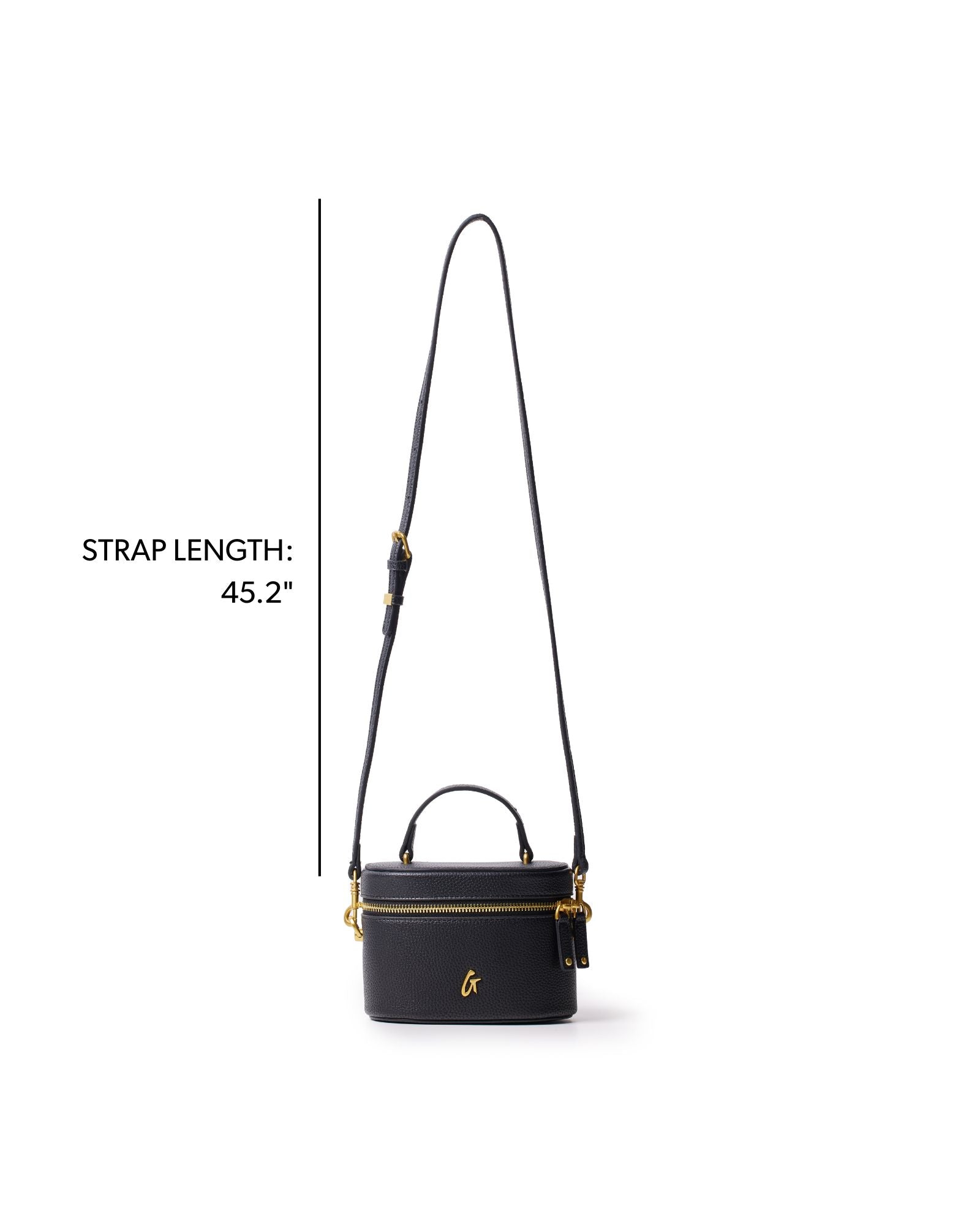 Mini pebble vanity bag in black with a gold zipper and adjustable strap, perfect for stylish organization on the go.