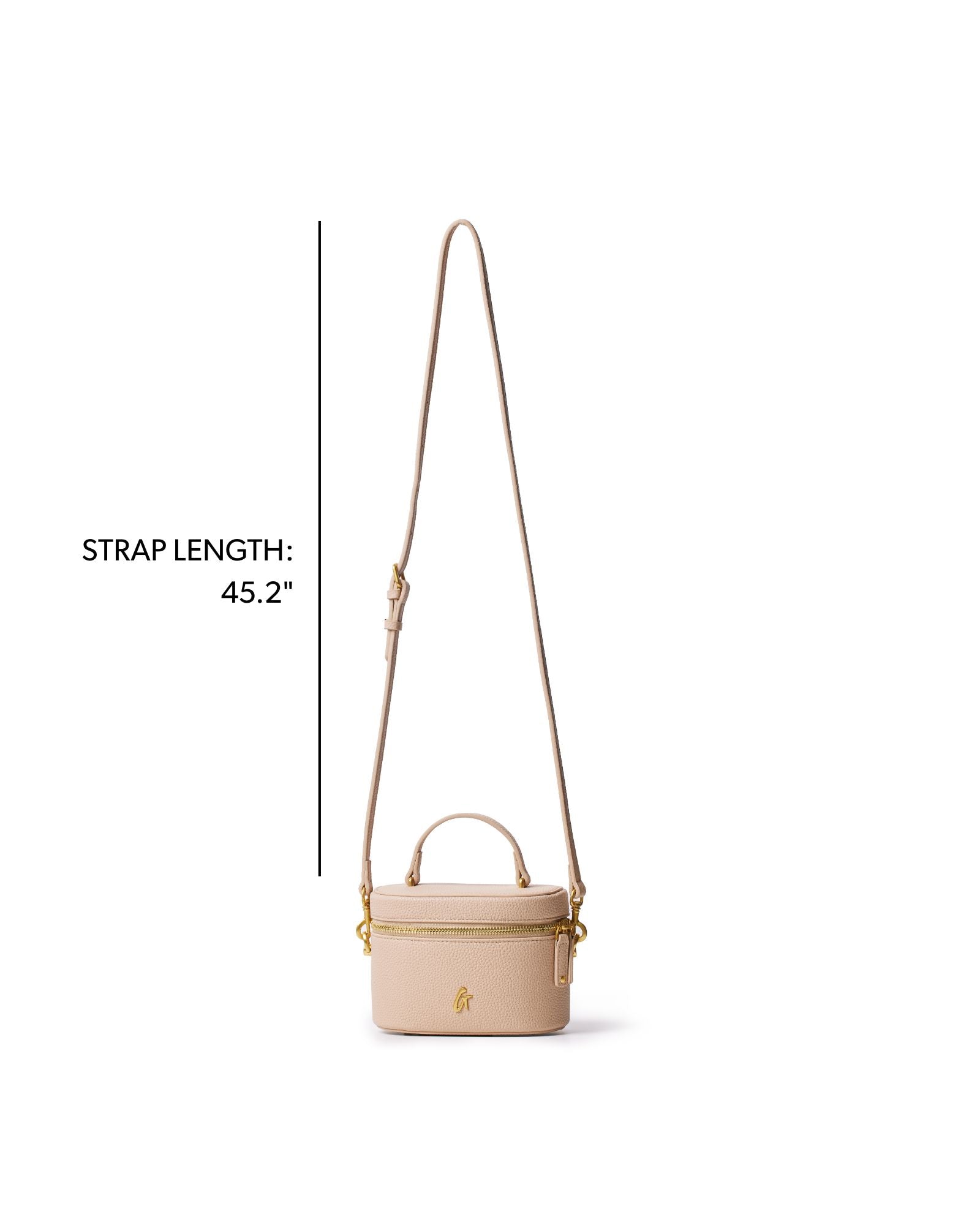 Mini pebble vanity bag in nude with a detachable strap, perfect for stylish on-the-go organization.