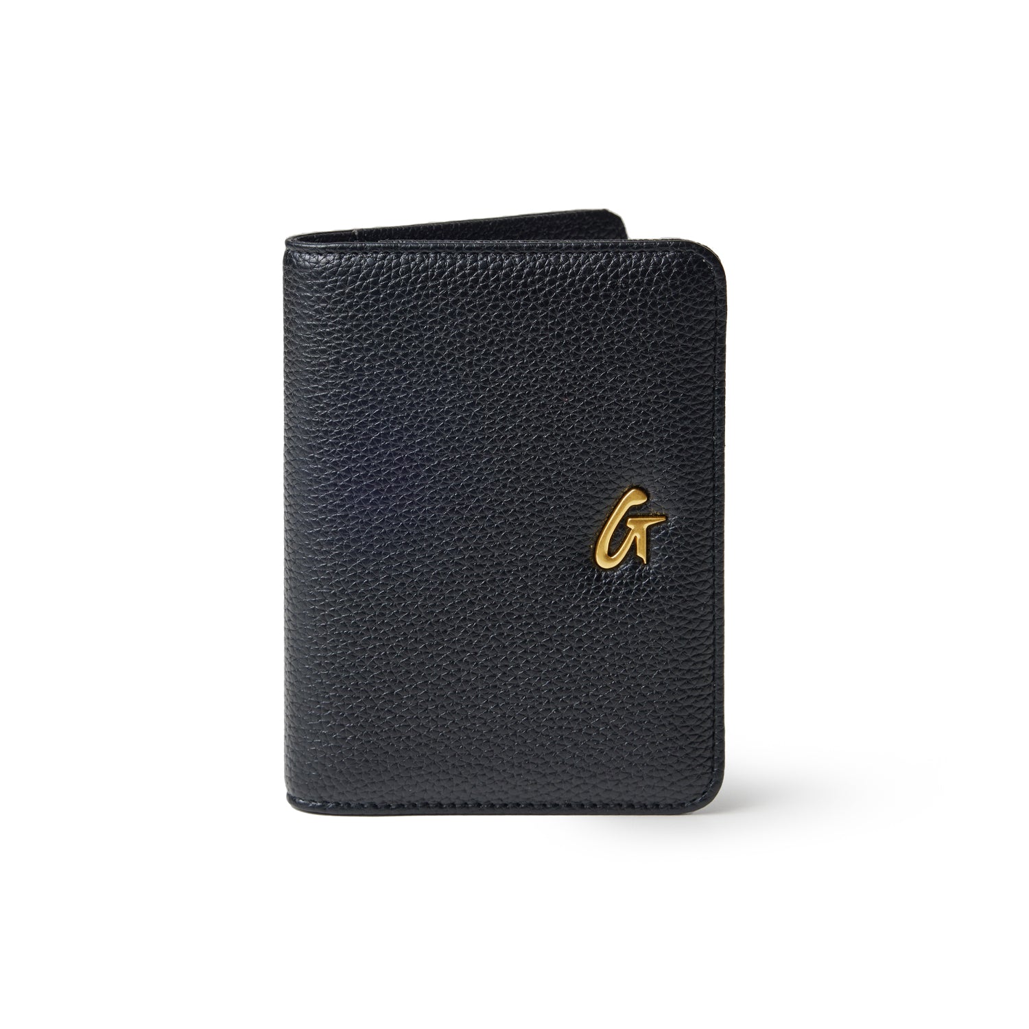 Black Pebble passport holder with a textured finish and a gold logo on the front.