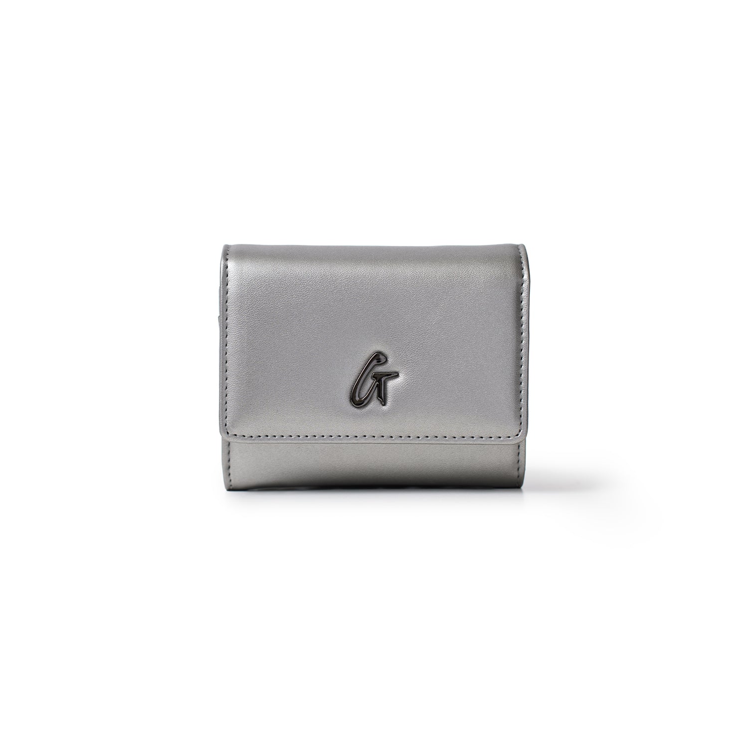 A silver gunmetal compact wallet with a black "G" logo on the front, featuring a sleek, minimalist design.