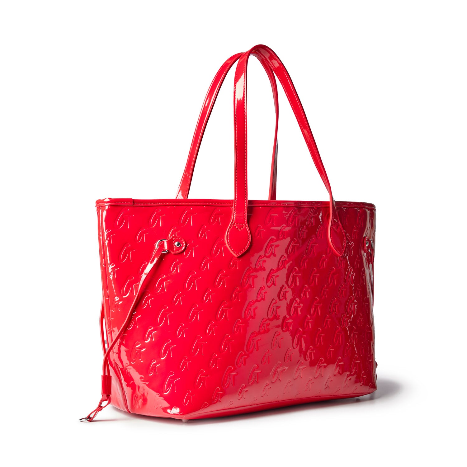 Glossy mirror red tote bag featuring a monogram design, perfect for adding a pop of color to any outfit.