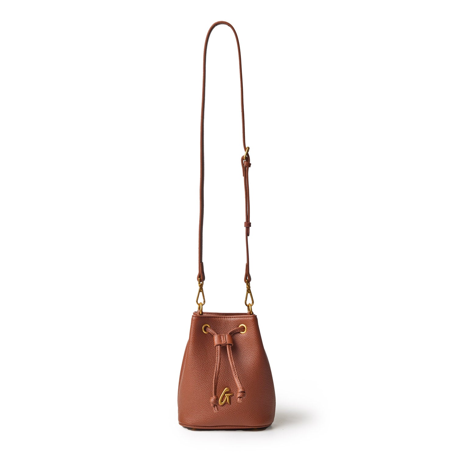 Brown pebble-textured bucket bag with a drawstring closure, gold hardware, and an adjustable strap.