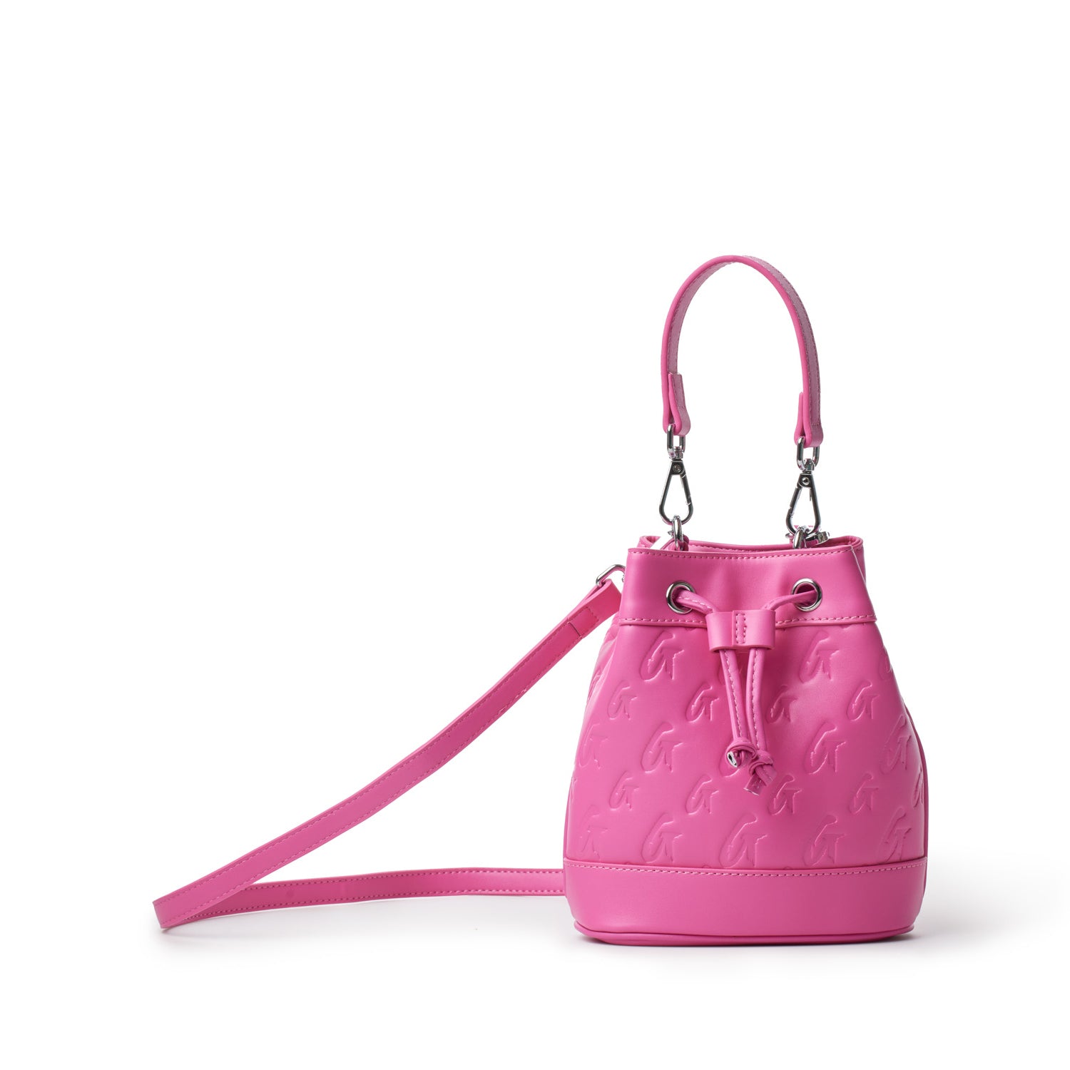 Mini monogram bucket bag in hot pink with embossed logo pattern, adjustable strap, and drawstring closure.