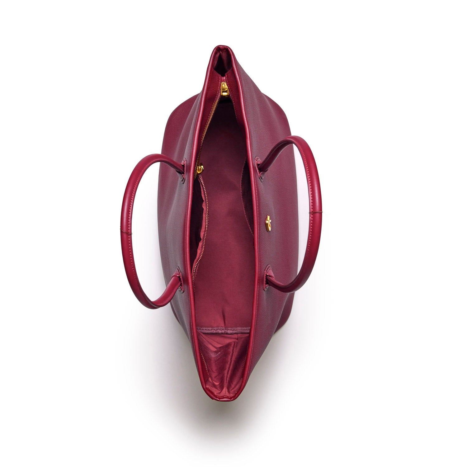 Burgundy pebble tote bag with spacious interior and dual handles for stylish and practical everyday use.