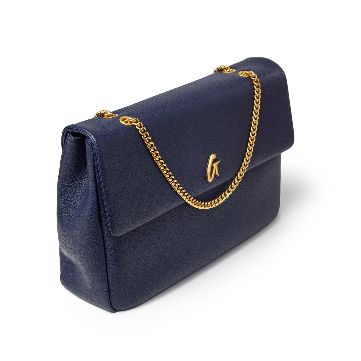 Navy XL Pebble Flap Bag with gold chain strap and logo accent, made of textured leather.
