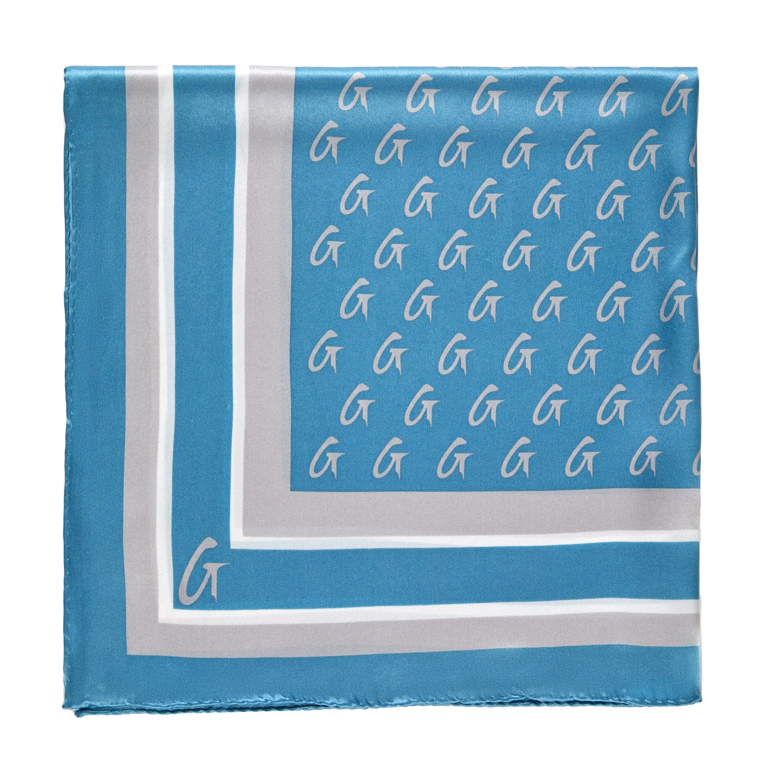 Medium silk scarf in blue and silver with a monogram pattern and border design.