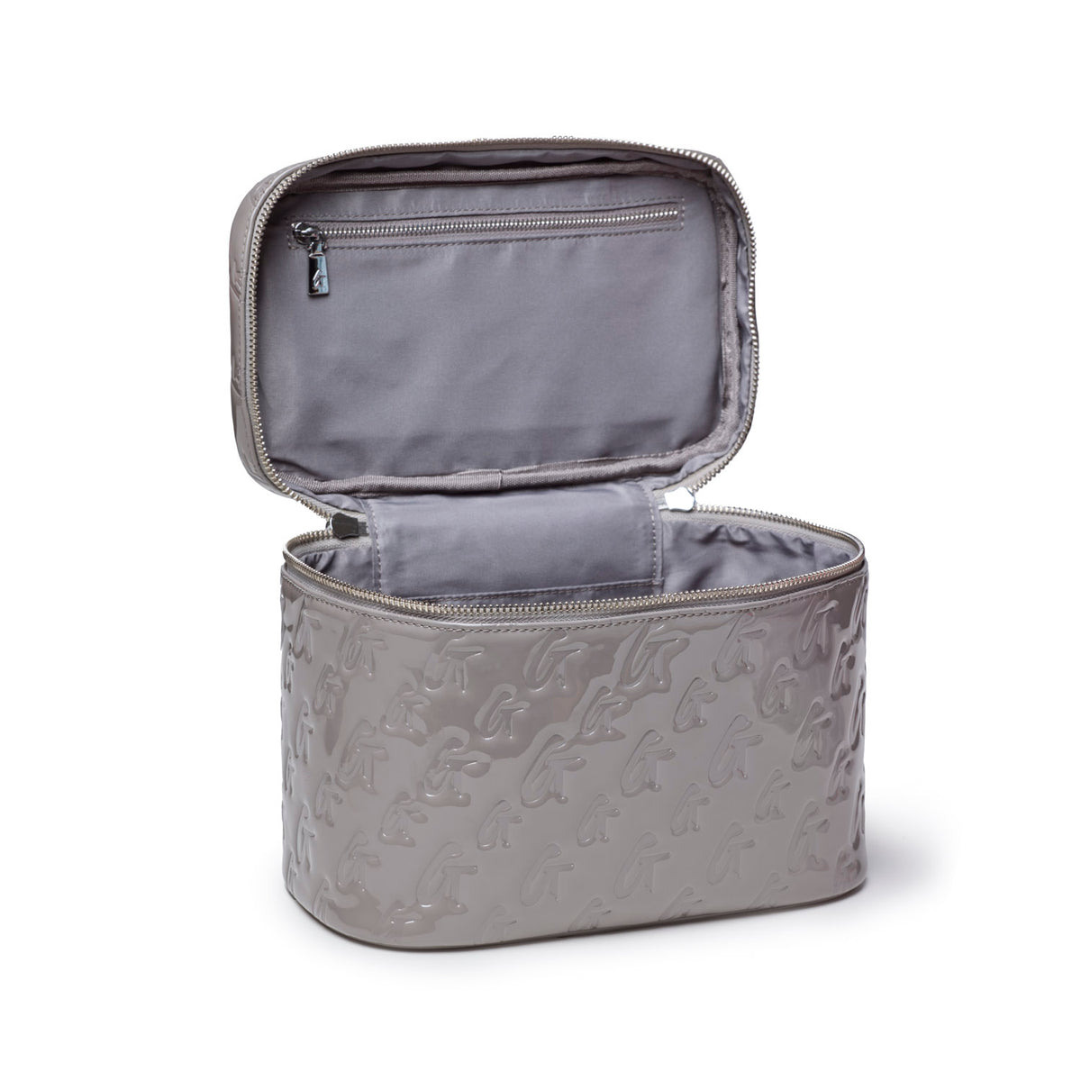 Large monogram toiletry bag in mirror gray with a zippered top and spacious interior for organizing beauty essentials.