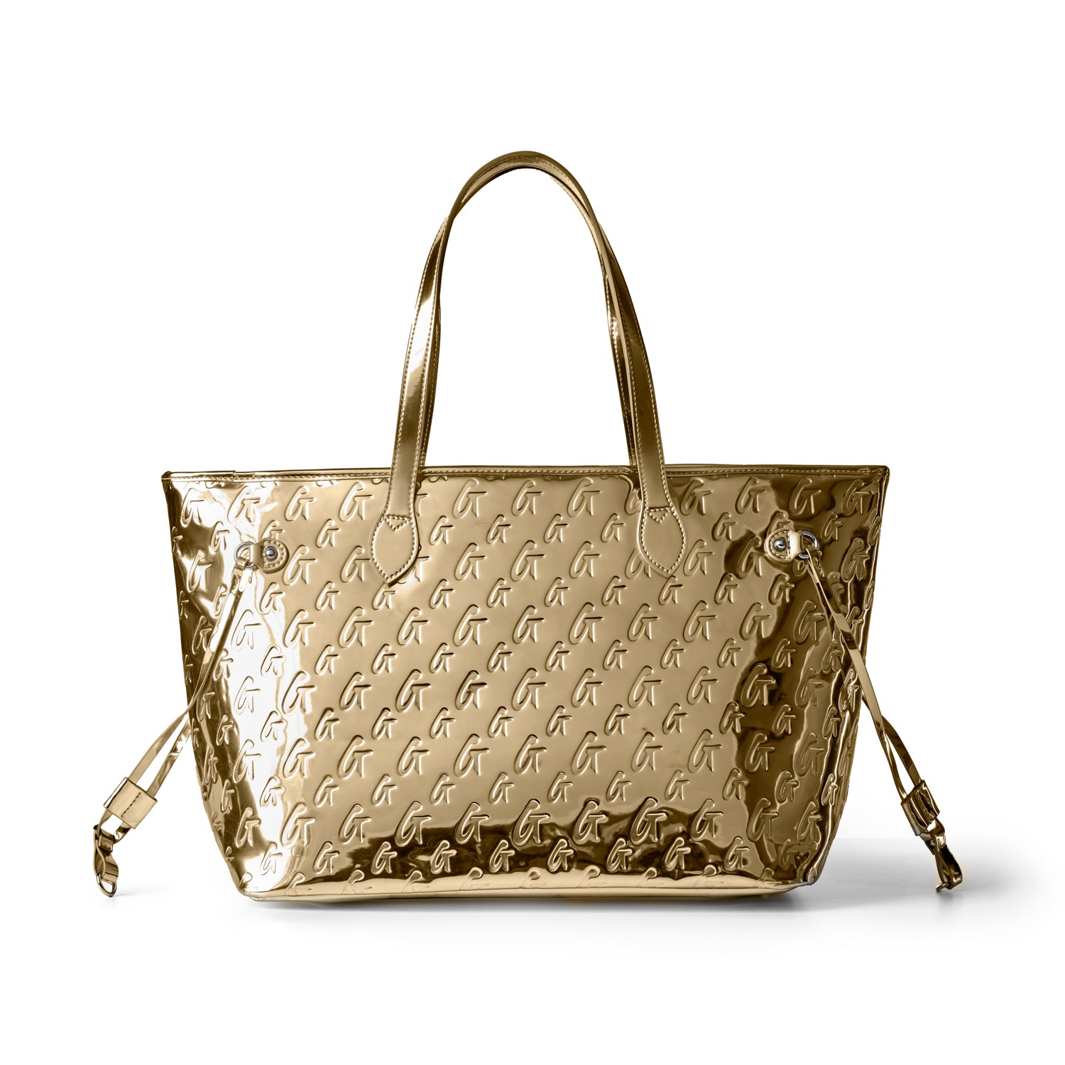 Metallic gold monogram tote bag with wristlet, featuring sleek handles and a stylish embossed design.