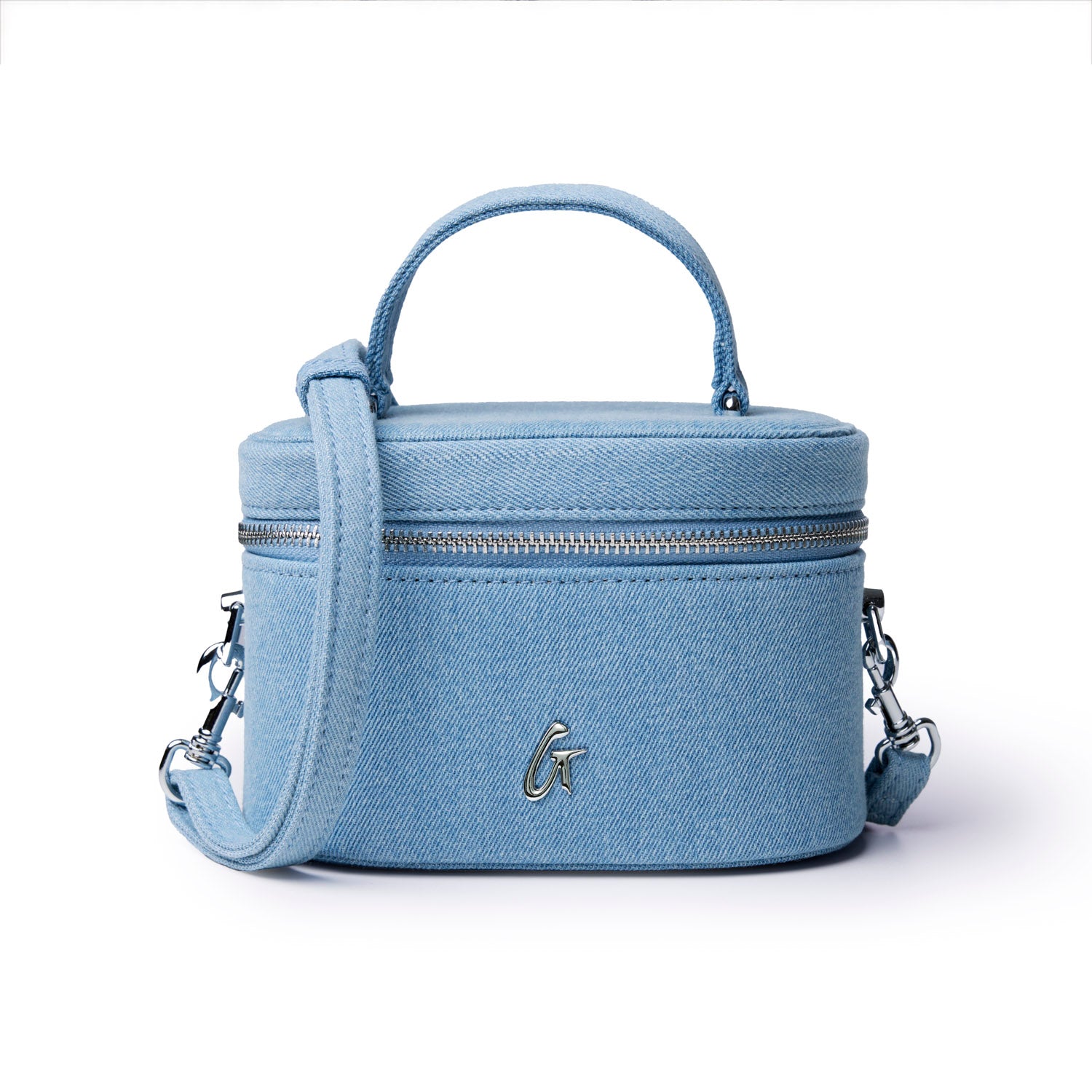 Mini denim silver vanity bag with a structured design, silver hardware, and a detachable strap for versatile styling.