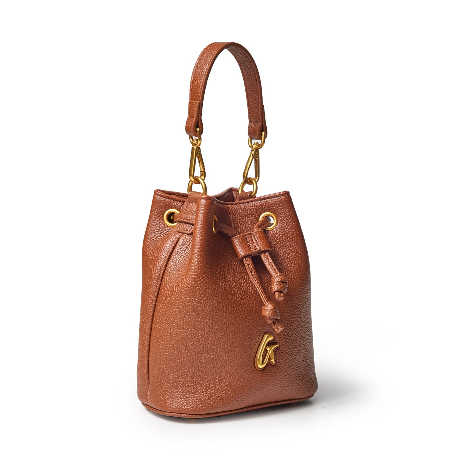 Brown mini pebble bucket bag with a top handle, gold hardware, and drawstring closure.