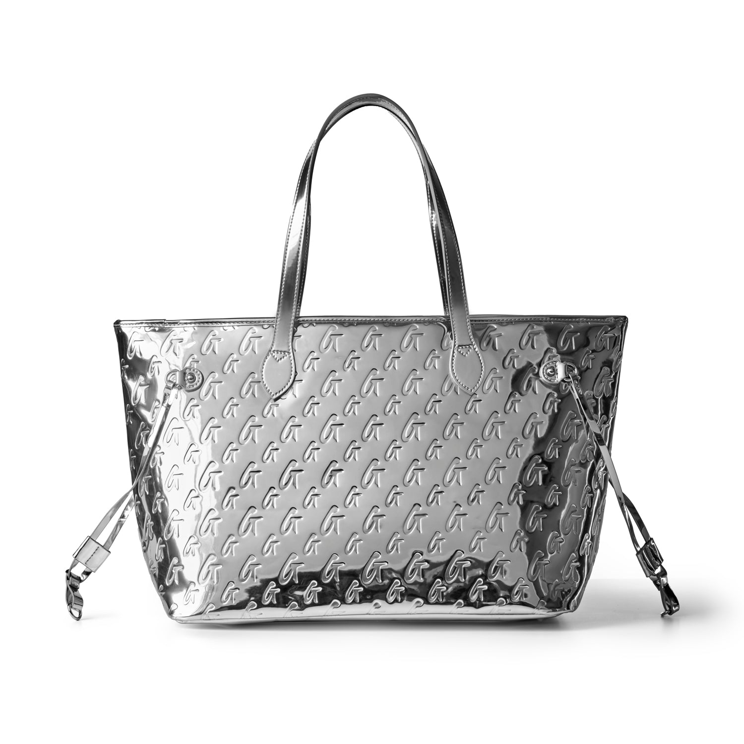 Metallic silver monogram tote bag with wristlet, featuring a sleek design and stylish handles for versatile use.