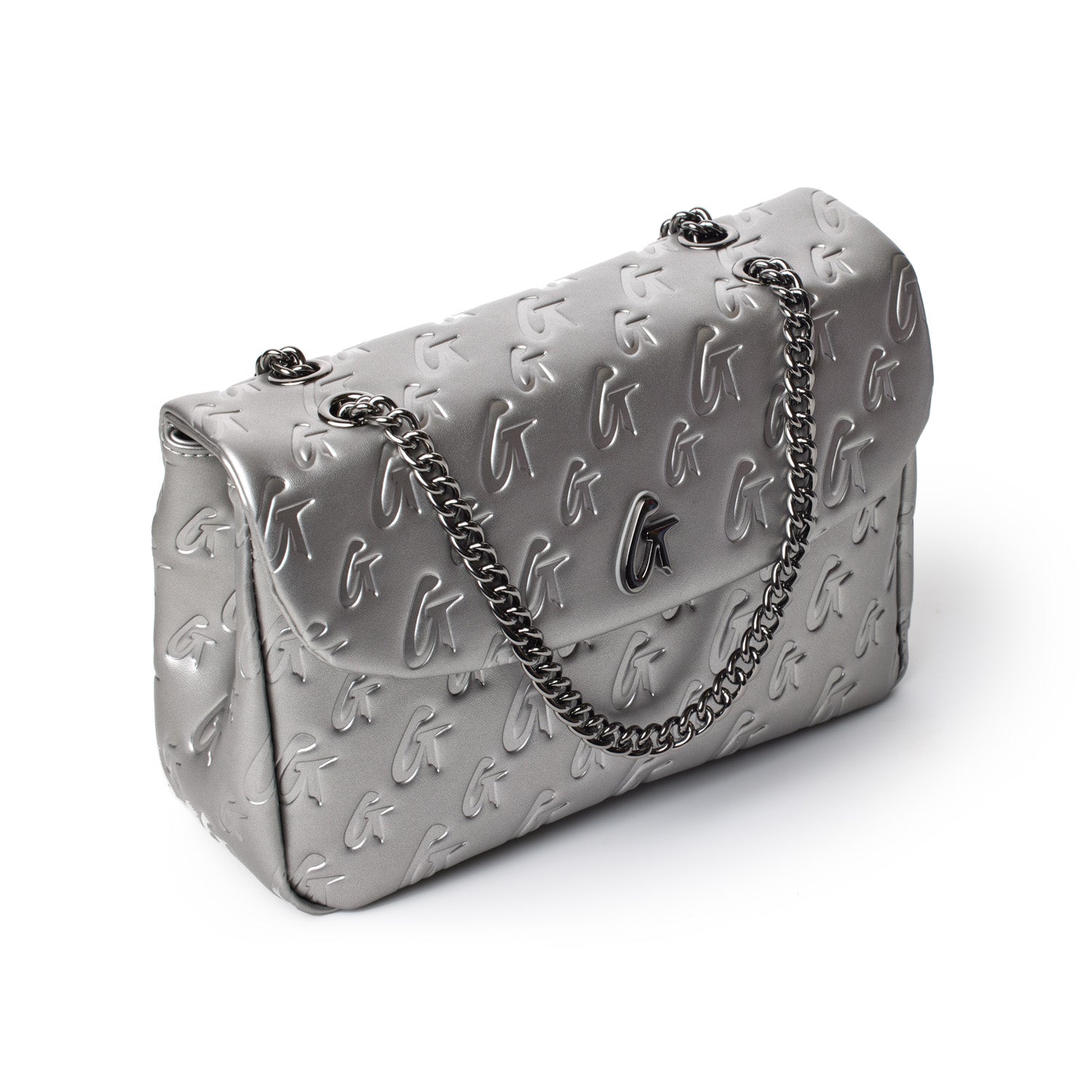 Medium platinum monogram flap bag with embossed logo pattern and a silver chain strap.