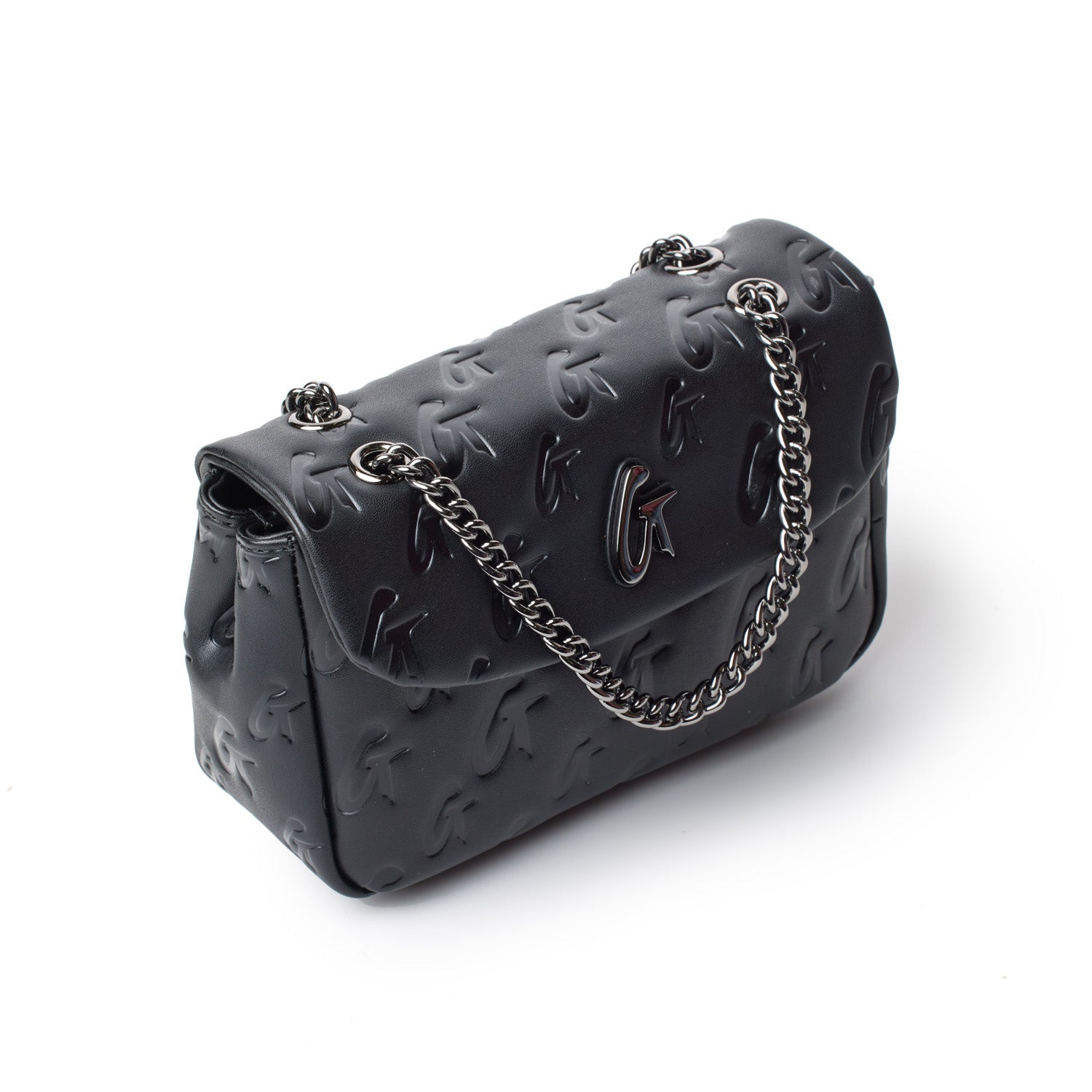 Black mini monogram flap bag with embossed logo pattern and silver chain strap on a white background.