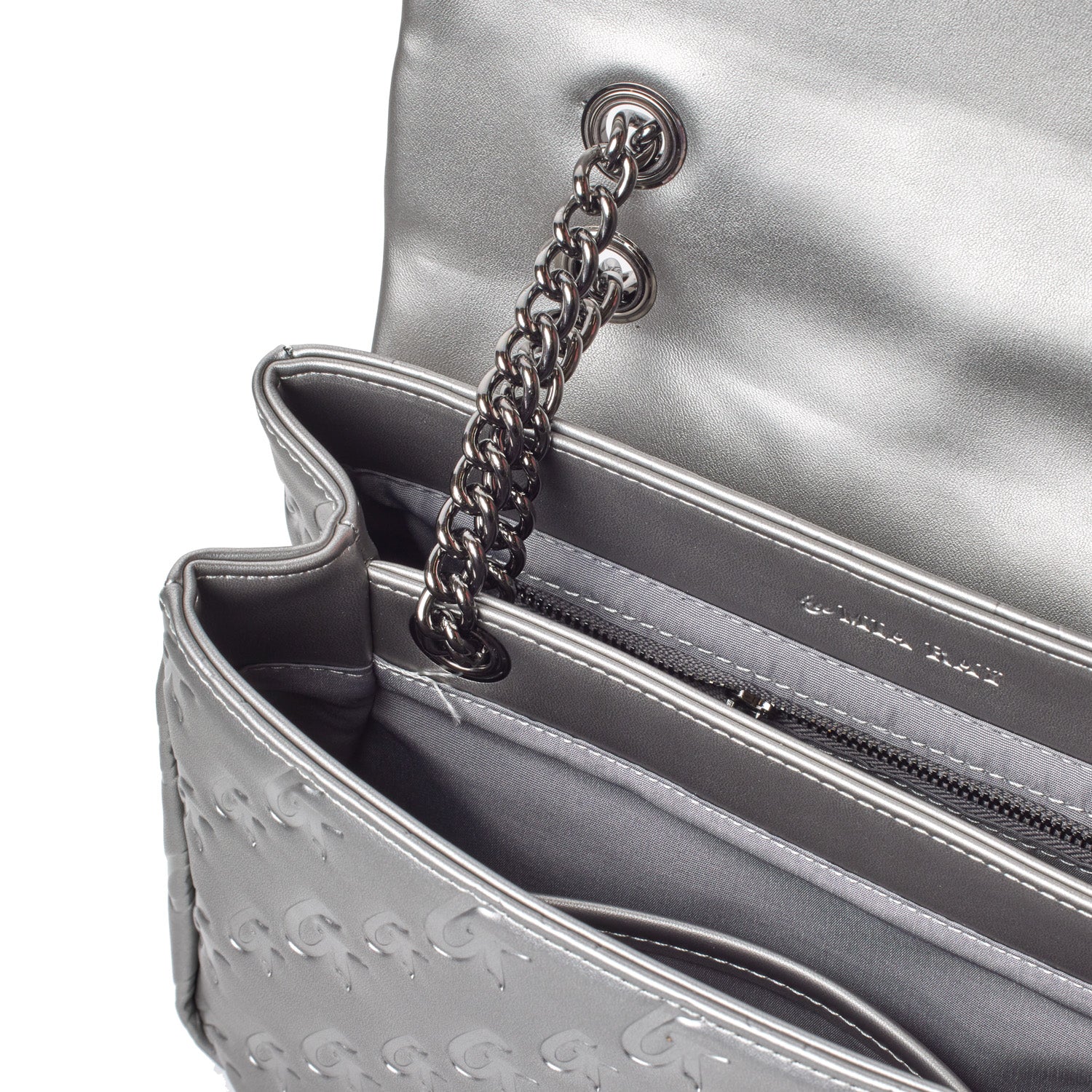 Silver medium monogram flap bag with a chain strap, interior zip pocket, and embossed logo detail.