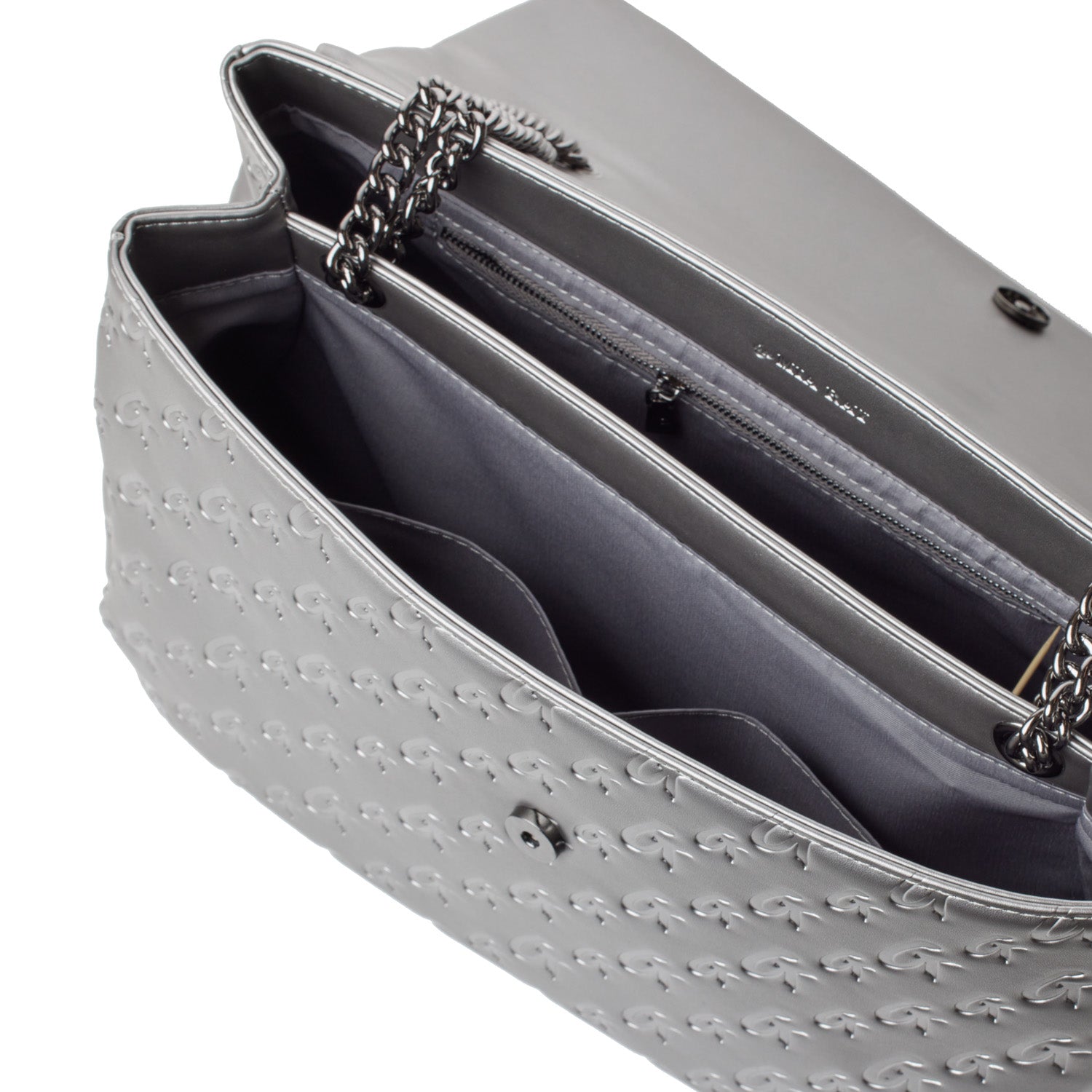Open XL Monogram Flap Bag in platinum with chain strap, interior compartments, zip pocket, and embossed exterior design.