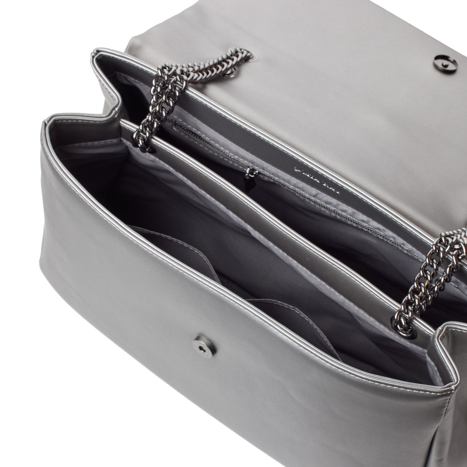 Open large platinum flap bag with interior compartments, chain strap, and sleek silver exterior.