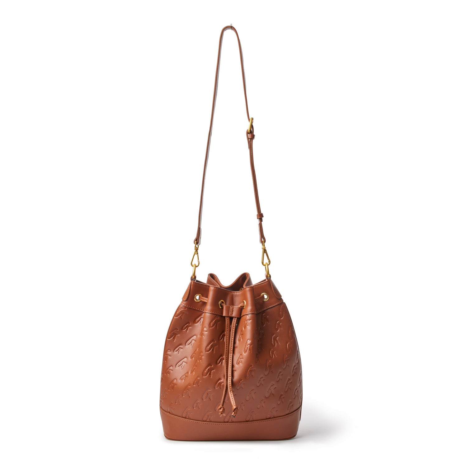 Brown Monogram Bucket Bag with adjustable strap, embossed logo pattern, and drawstring closure.