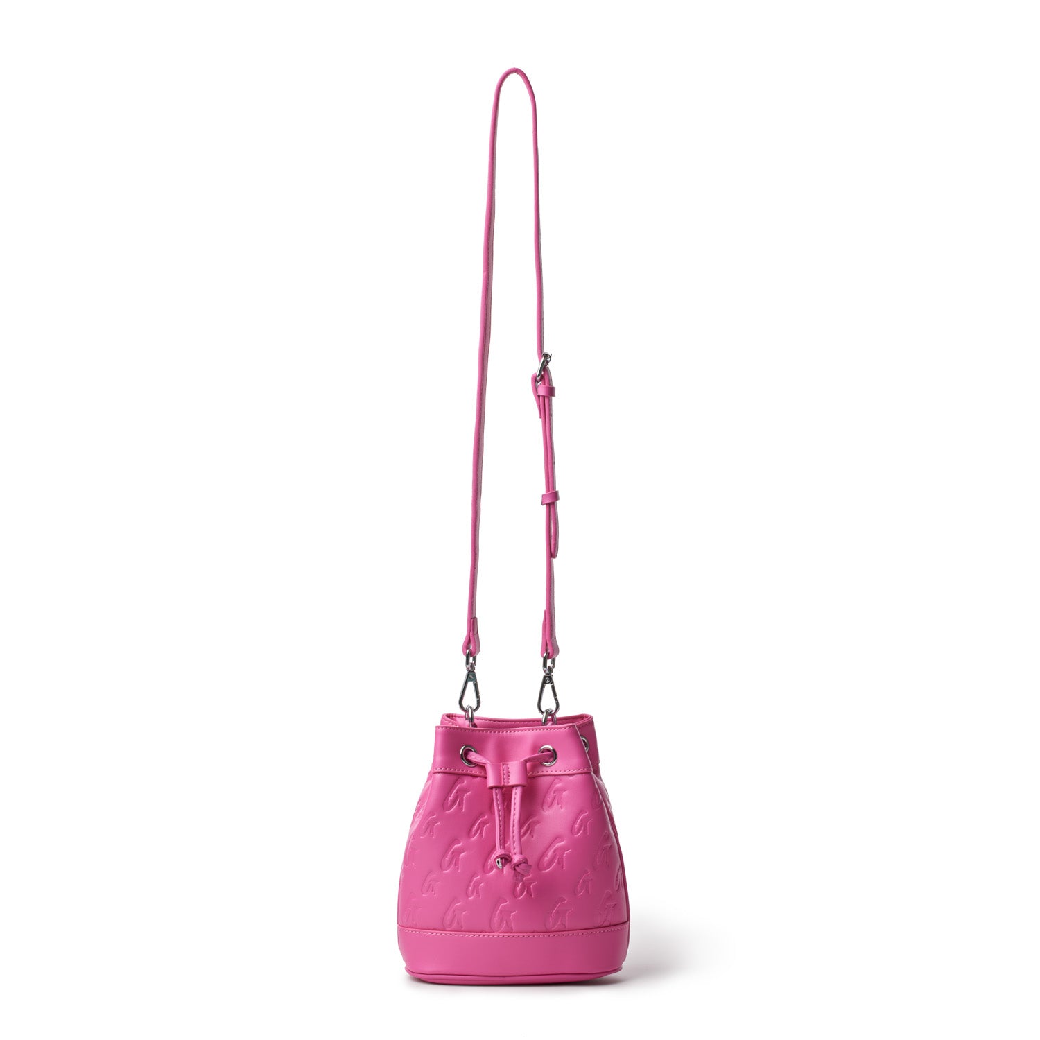 Mini monogram bucket bag in hot pink with embossed logo pattern, adjustable strap, and drawstring closure.