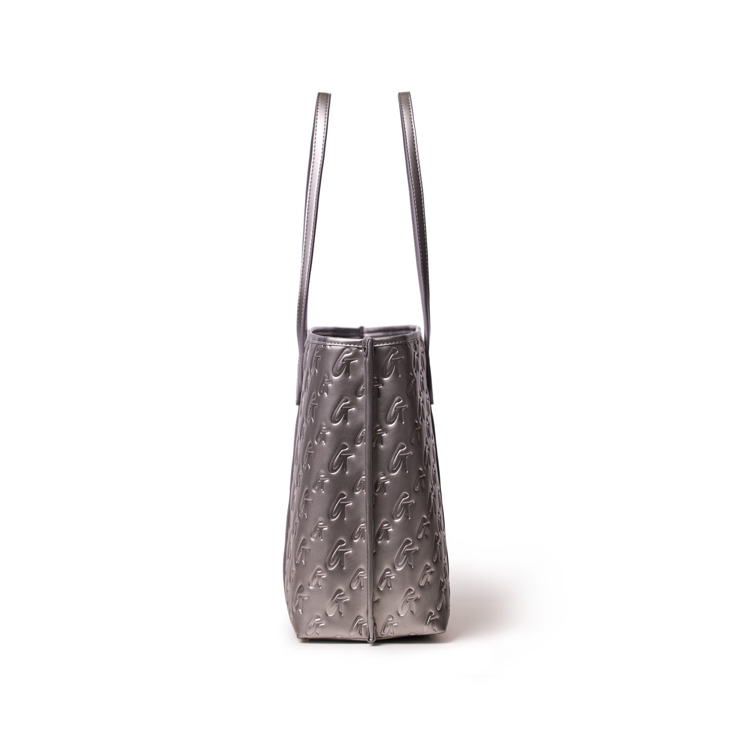 Monogram Sleek Tote in platinum with embossed logo pattern, featuring long shoulder straps and a structured design.