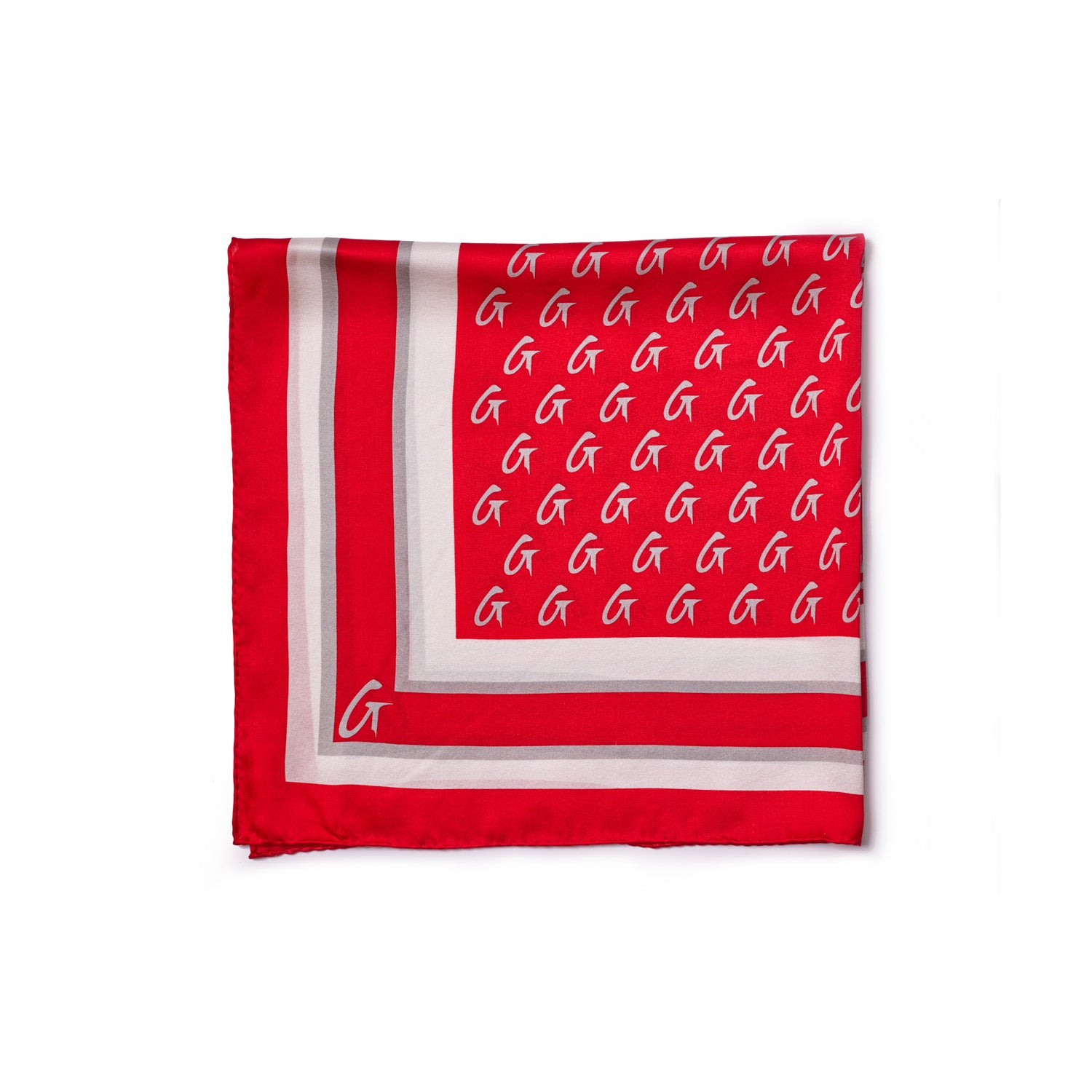 Red silk scarf with a monogram pattern, featuring white "G" logos and striped border design.