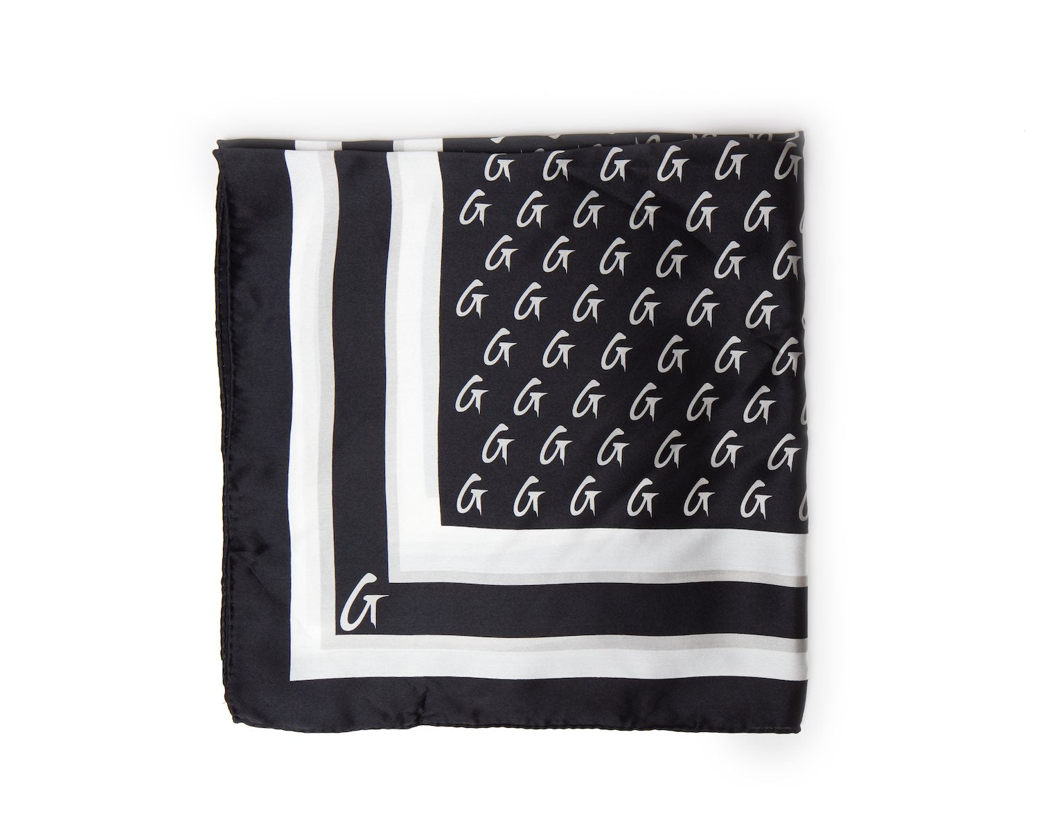 Black silk scarf with a monogram pattern, featuring white G logos and a white border, styled in a medium size.