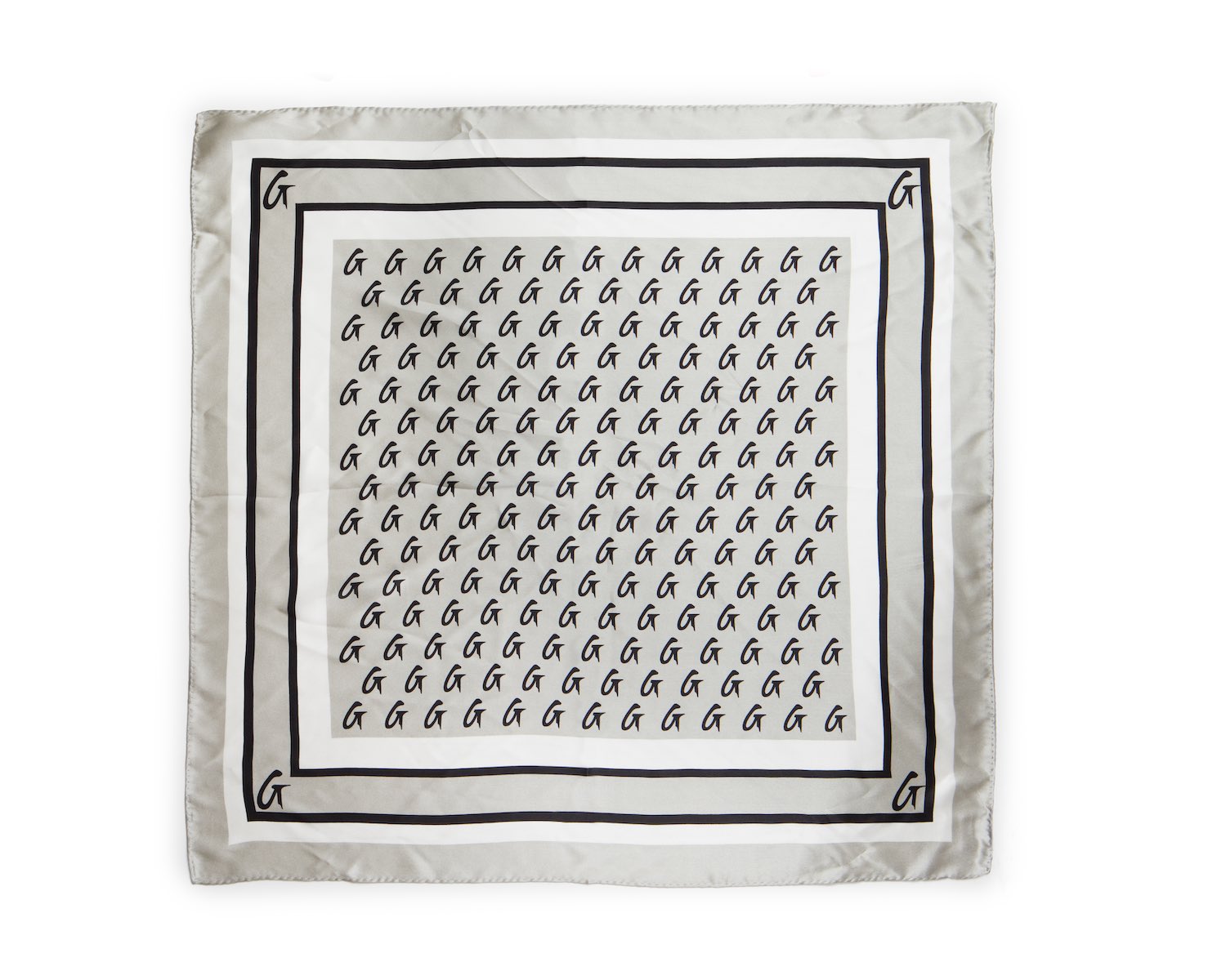 Medium silk scarf with a silver background featuring a black monogram pattern and border design.