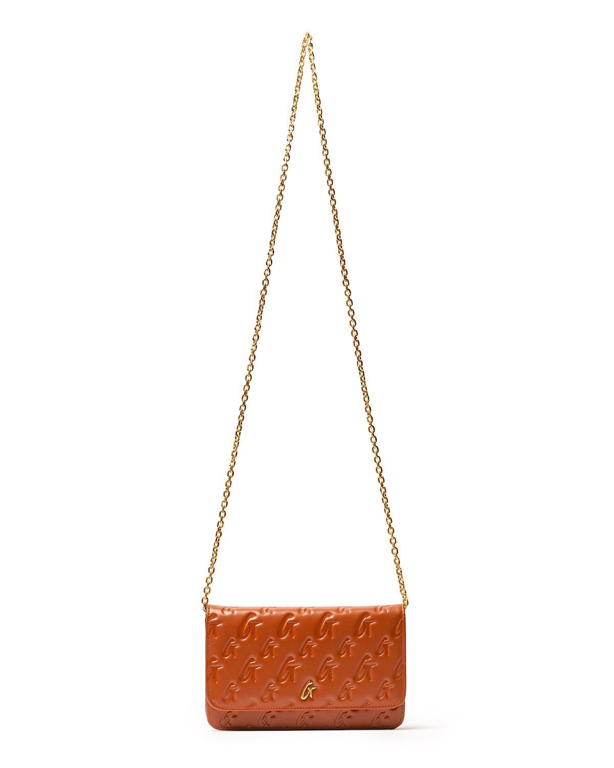 Brown Monogram Gold WOC handbag with a gold chain strap and embossed logo pattern, featuring a gold G logo on the front.