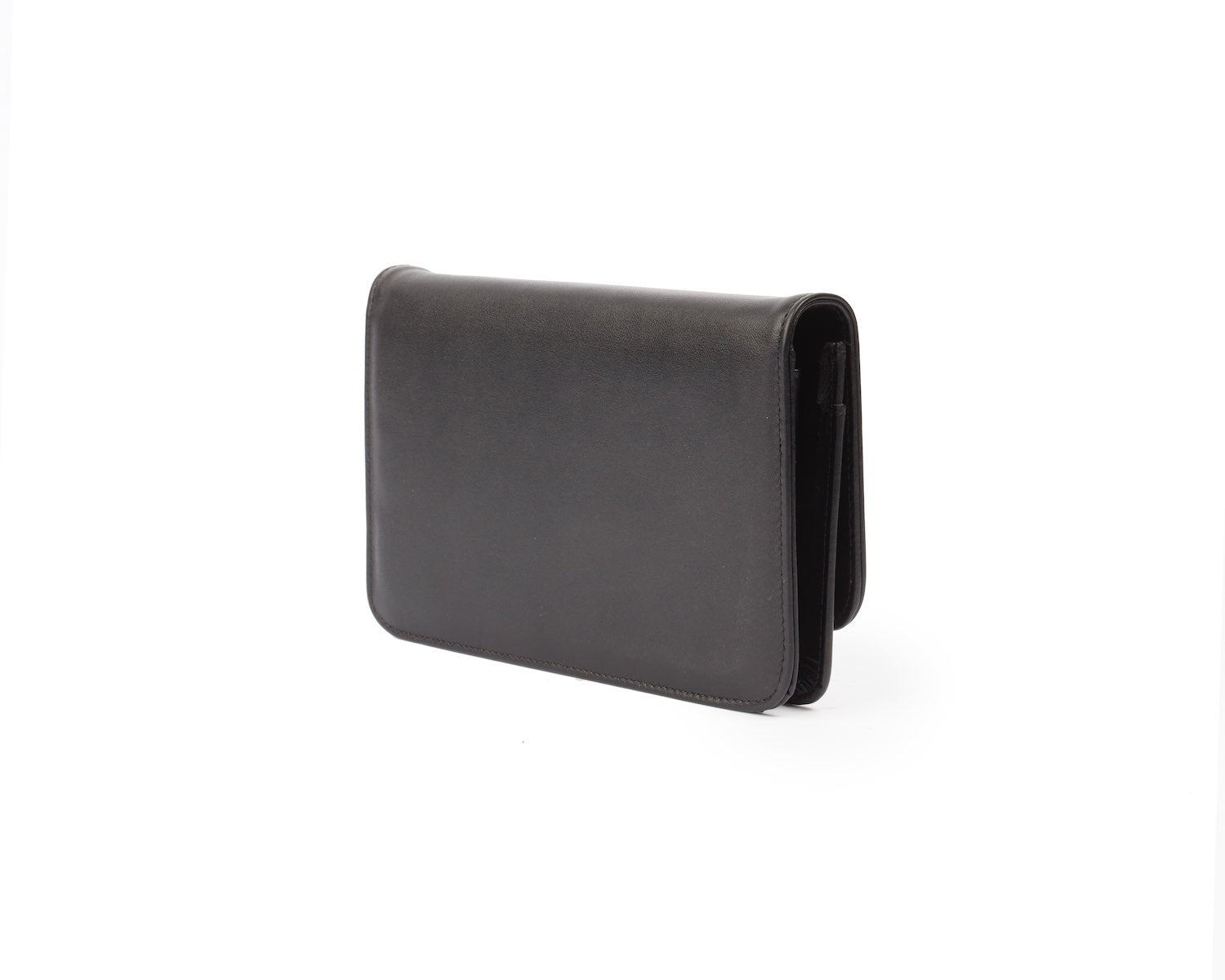 Black gunmetal WOC wallet with a sleek, minimalist design, featuring a smooth finish and compact rectangular shape.