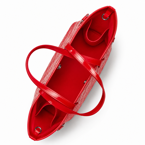 Red monogram travel set featuring a spacious interior and dual handles for stylish and practical travel.