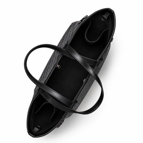 Spacious black monogram travel set featuring a sleek design and sturdy handles for stylish travel convenience.