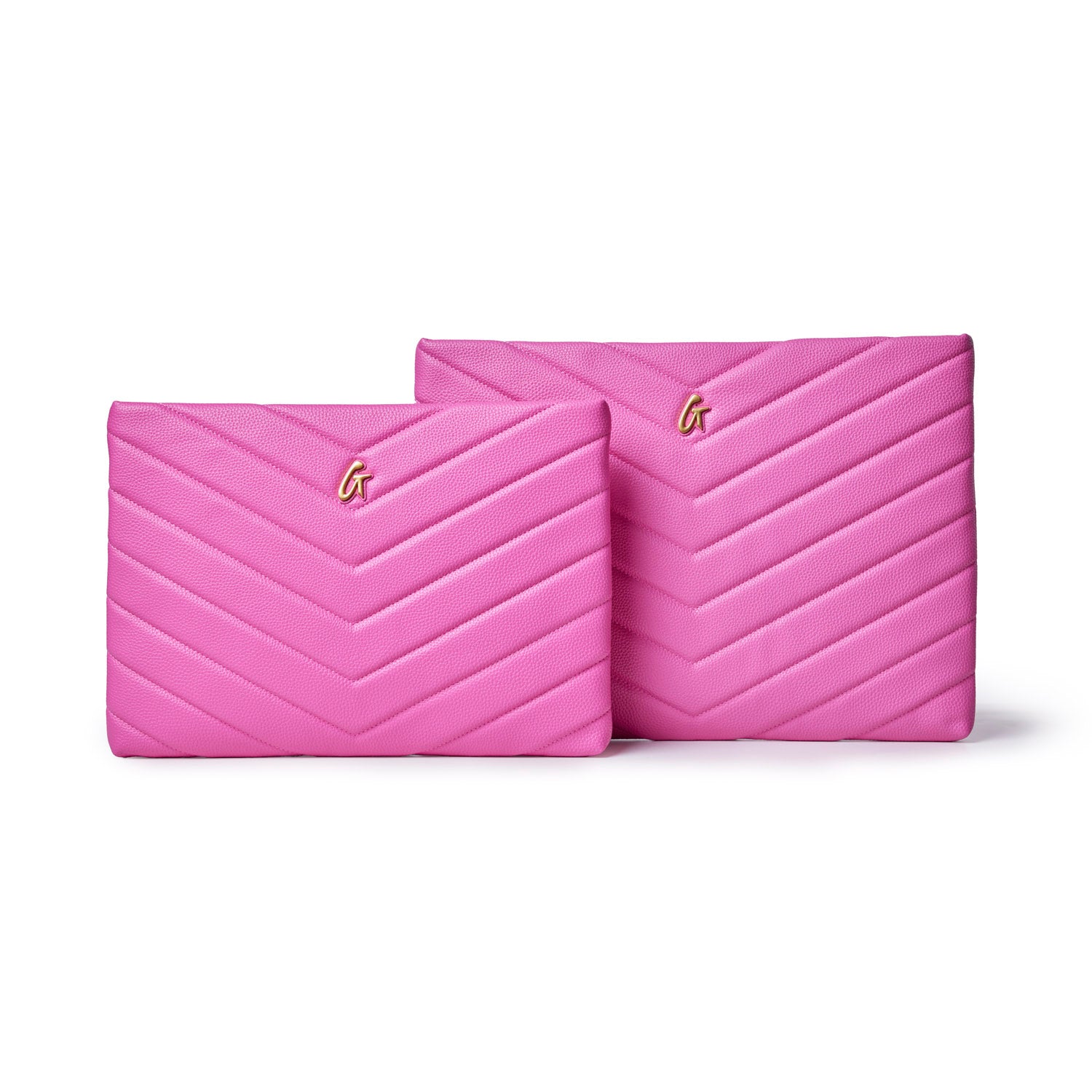 Hot pink pebble laptop sleeves with a chevron pattern and a gold logo, perfect for stylish protection of devices.